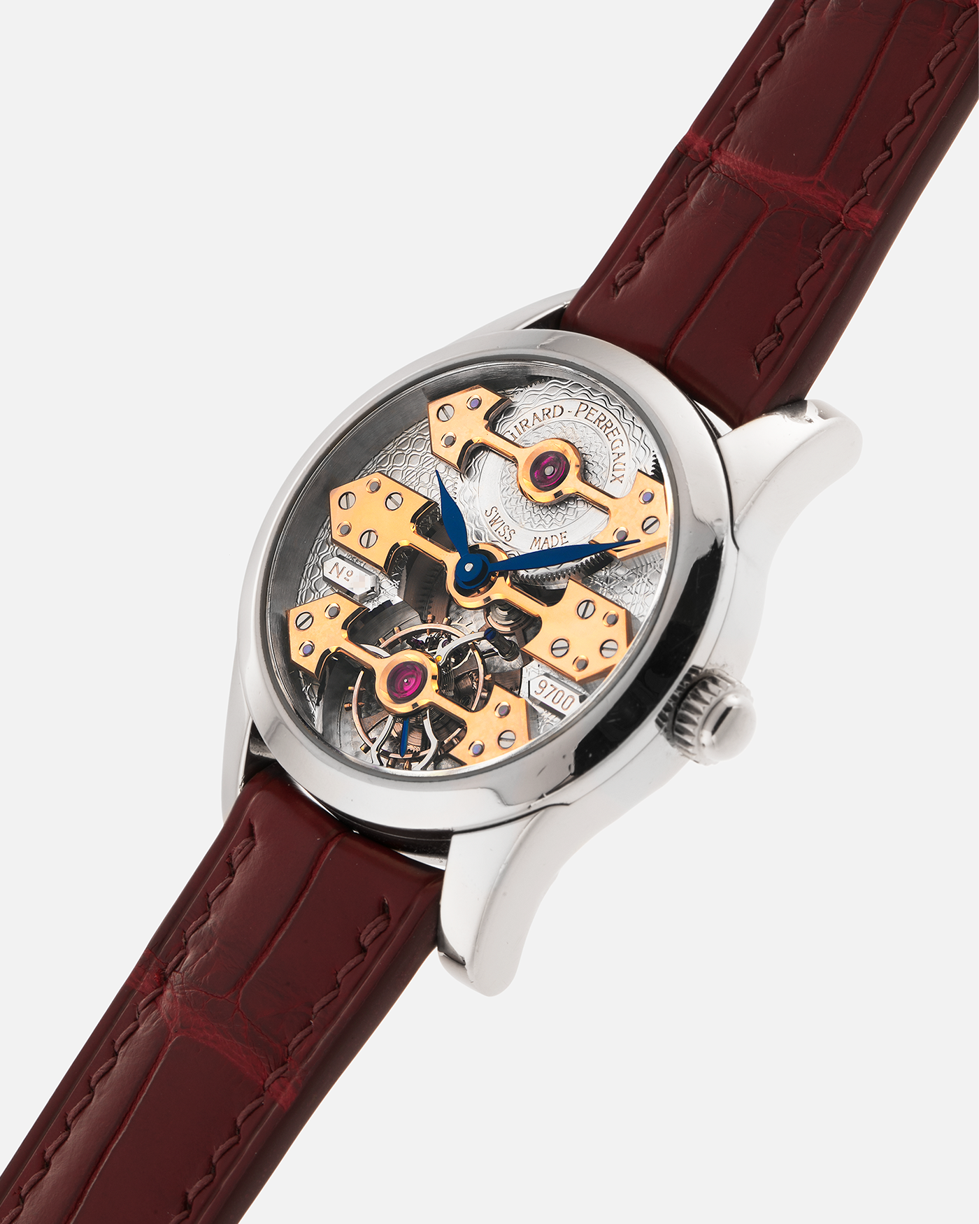 Brand: Girard Perregaux
Year: Late 90’s / Early 2000’s
Model: Three Bridges Tourbillon, “Tourbillon Sous Trois Ponts d'Or”
Reference: 9700
Material: 18k White Gold
Movement: Manual-Winding Girard Perregaux Cal. T3P
Case Dimensions: 31mm Diameter 9mm Thickness
Lug Width: 20mm
Strap: Custom Order Burgundy Alligator Strap, Girard Perregaux Iridescent Blue Alligator Strap and 18k White Gold Girard Perregaux Deployant Clasp
