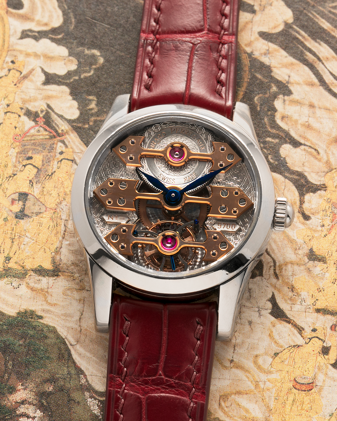Brand: Girard Perregaux
Year: Late 90’s / Early 2000’s
Model: Three Bridges Tourbillon, “Tourbillon Sous Trois Ponts d'Or”
Reference: 9700
Material: 18k White Gold
Movement: Manual-Winding Girard Perregaux Cal. T3P
Case Dimensions: 31mm Diameter 9mm Thickness
Lug Width: 20mm
Strap: Custom Order Burgundy Alligator Strap, Girard Perregaux Iridescent Blue Alligator Strap and 18k White Gold Girard Perregaux Deployant Clasp
