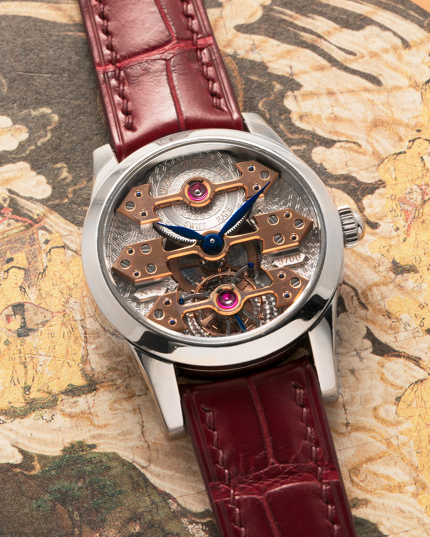Brand: Girard Perregaux
Year: Late 90’s / Early 2000’s
Model: Three Bridges Tourbillon, “Tourbillon Sous Trois Ponts d'Or”
Reference: 9700
Material: 18k White Gold
Movement: Manual-Winding Girard Perregaux Cal. T3P
Case Dimensions: 31mm Diameter 9mm Thickness
Lug Width: 20mm
Strap: Custom Order Burgundy Alligator Strap, Girard Perregaux Iridescent Blue Alligator Strap and 18k White Gold Girard Perregaux Deployant Clasp