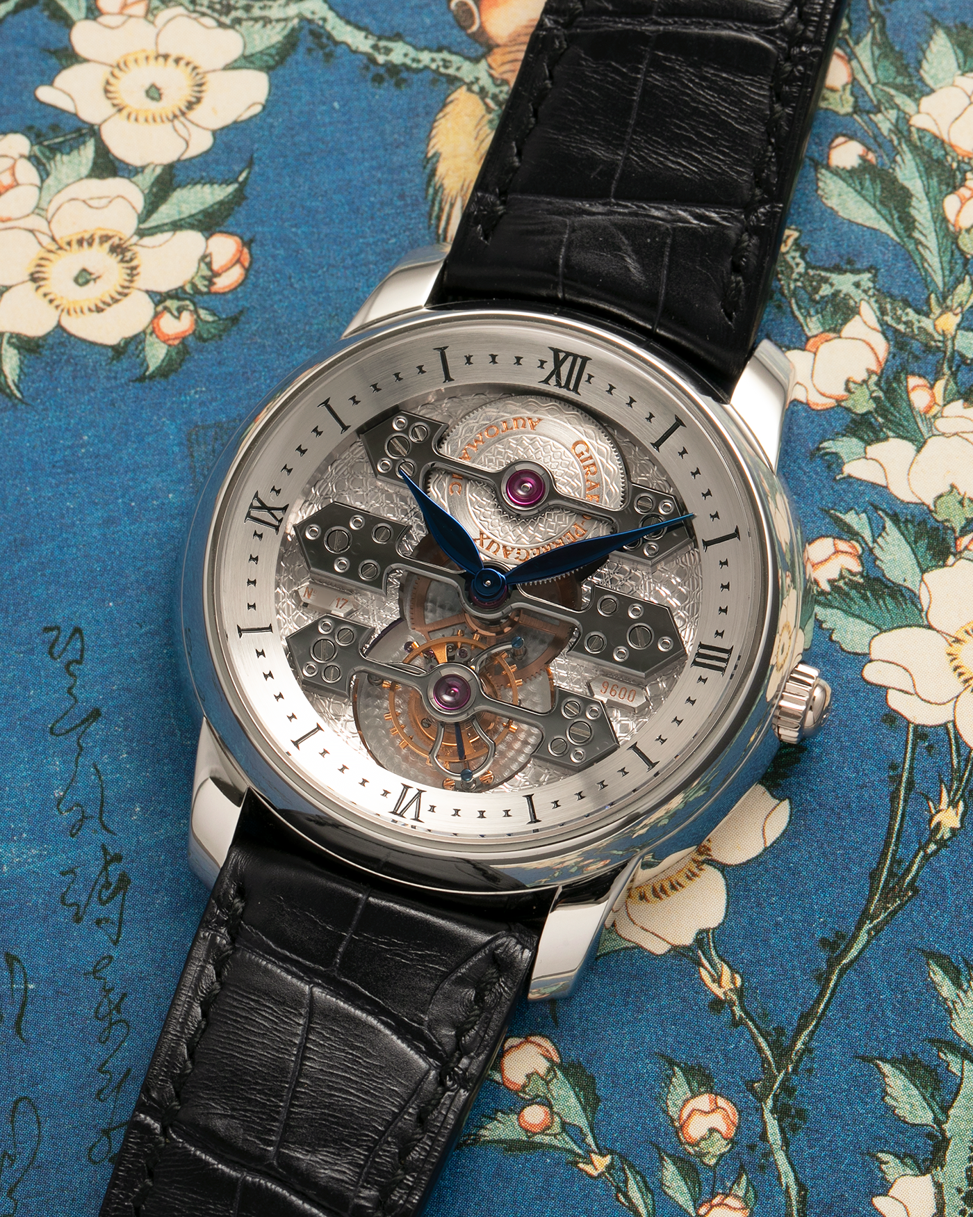Brand: Girard Perregaux
Year: 2007
Model: Three Bridges Tourbillon, Limited Edition of 17 Pieces for SHH
Reference: 99095
Material: Platinum 950
Movement: Girard Perregaux Cal. 9600 Tourbillon, Self-Winding
Case Dimensions: 42mm x 11mm (Lug-to-Lug 47.5mm)
Lug Width: 21mm
Strap: Girard Perregaux Black Alligator Strap with Signed Platinum 950 Deployant Clasp