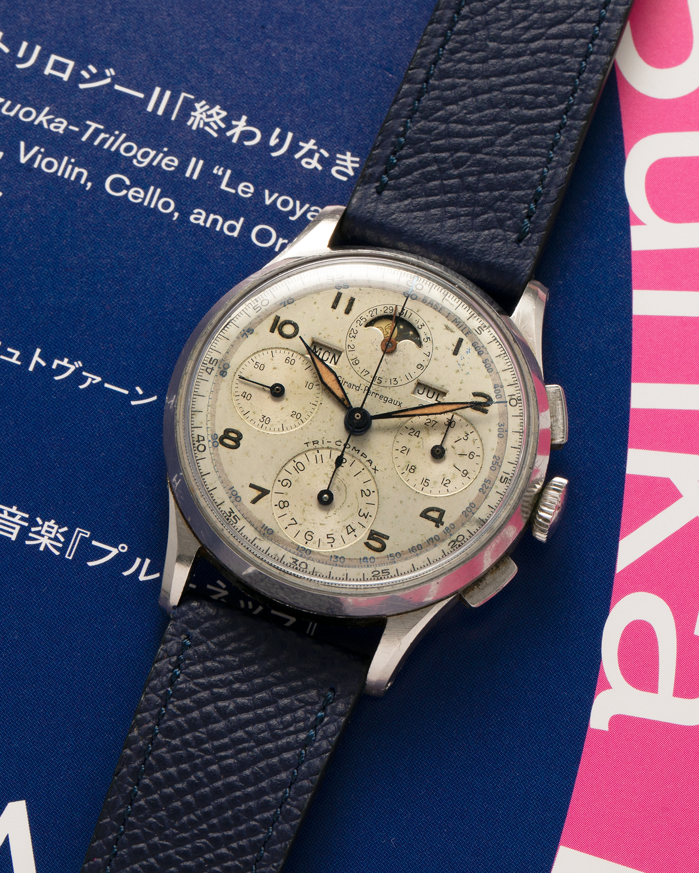 Brand: Girard Perregaux
Year: 1940s
Model: Tri-Compax
Material: Stainless Steel
Movement: Universal Genève (Branded Girard Perregaux) Cal. 287, Manual-Winding
Case Diameter: 37mm x 13mm (Lug-to-Lug 44.5mm)
Lug Width: 19mm
Strap: Nostime Dark Navy Textured Calf Leather Strap