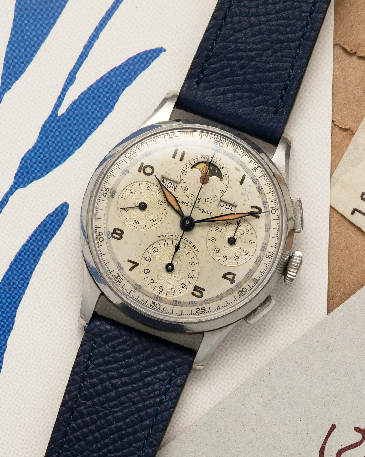 Brand: Girard Perregaux
Year: 1940s
Model: Tri-Compax
Material: Stainless Steel
Movement: Universal Genève (Branded Girard Perregaux) Cal. 287, Manual-Winding
Case Diameter: 37mm x 13mm (Lug-to-Lug 44.5mm)
Lug Width: 19mm
Strap: Nostime Dark Navy Textured Calf Leather Strap