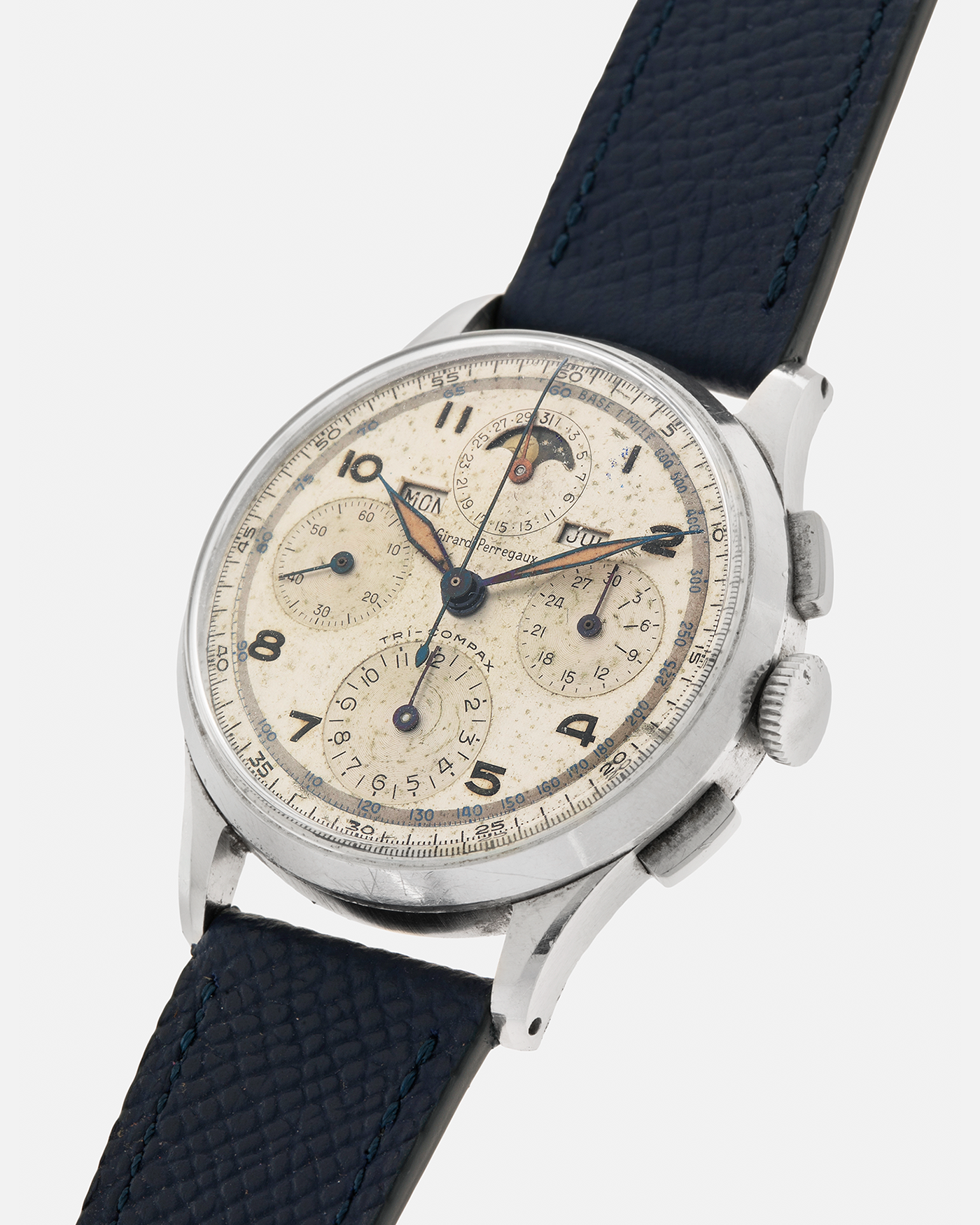 Brand: Girard Perregaux
Year: 1940s
Model: Tri-Compax
Material: Stainless Steel
Movement: Universal Genève (Branded Girard Perregaux) Cal. 287, Manual-Winding
Case Diameter: 37mm x 13mm (Lug-to-Lug 44.5mm)
Lug Width: 19mm
Strap: Nostime Dark Navy Textured Calf Leather Strap