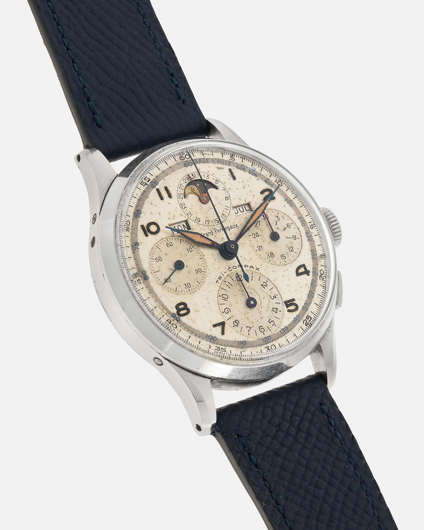Brand: Girard Perregaux
Year: 1940s
Model: Tri-Compax
Material: Stainless Steel
Movement: Universal Genève (Branded Girard Perregaux) Cal. 287, Manual-Winding
Case Diameter: 37mm x 13mm (Lug-to-Lug 44.5mm)
Lug Width: 19mm
Strap: Nostime Dark Navy Textured Calf Leather Strap