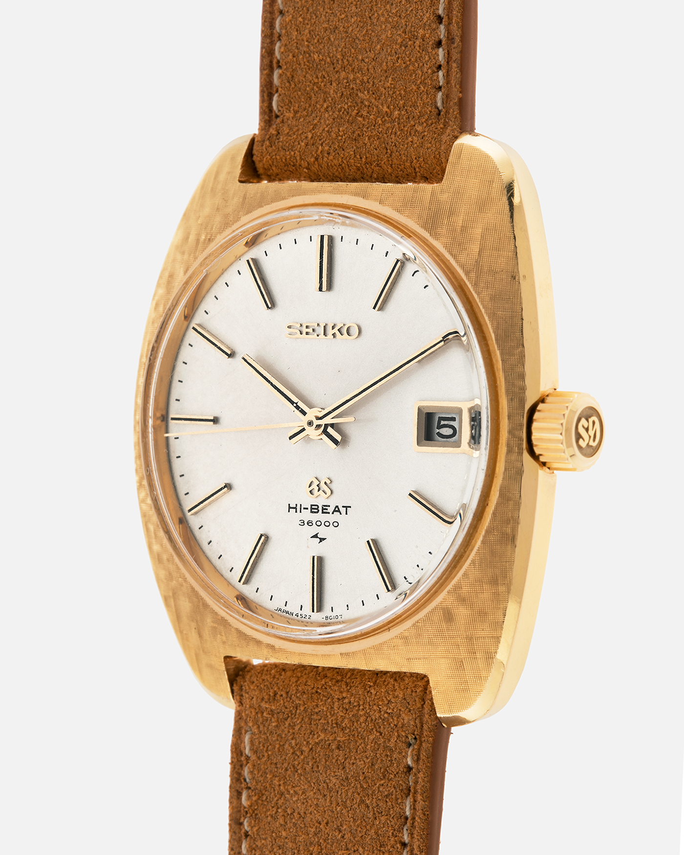 Brand: Grand Seiko
Year: Circa 1970’s
Reference Number: 4522-8010
Material: 18-carat Yellow Gold
Movement: Cal. 4520A
Case Diameter: 36mm Diameter 9mm Thickness
Lug Width: 18mm
Bracelet/Strap: Nostime Cognac Suede Strap and Unsigned Buckle