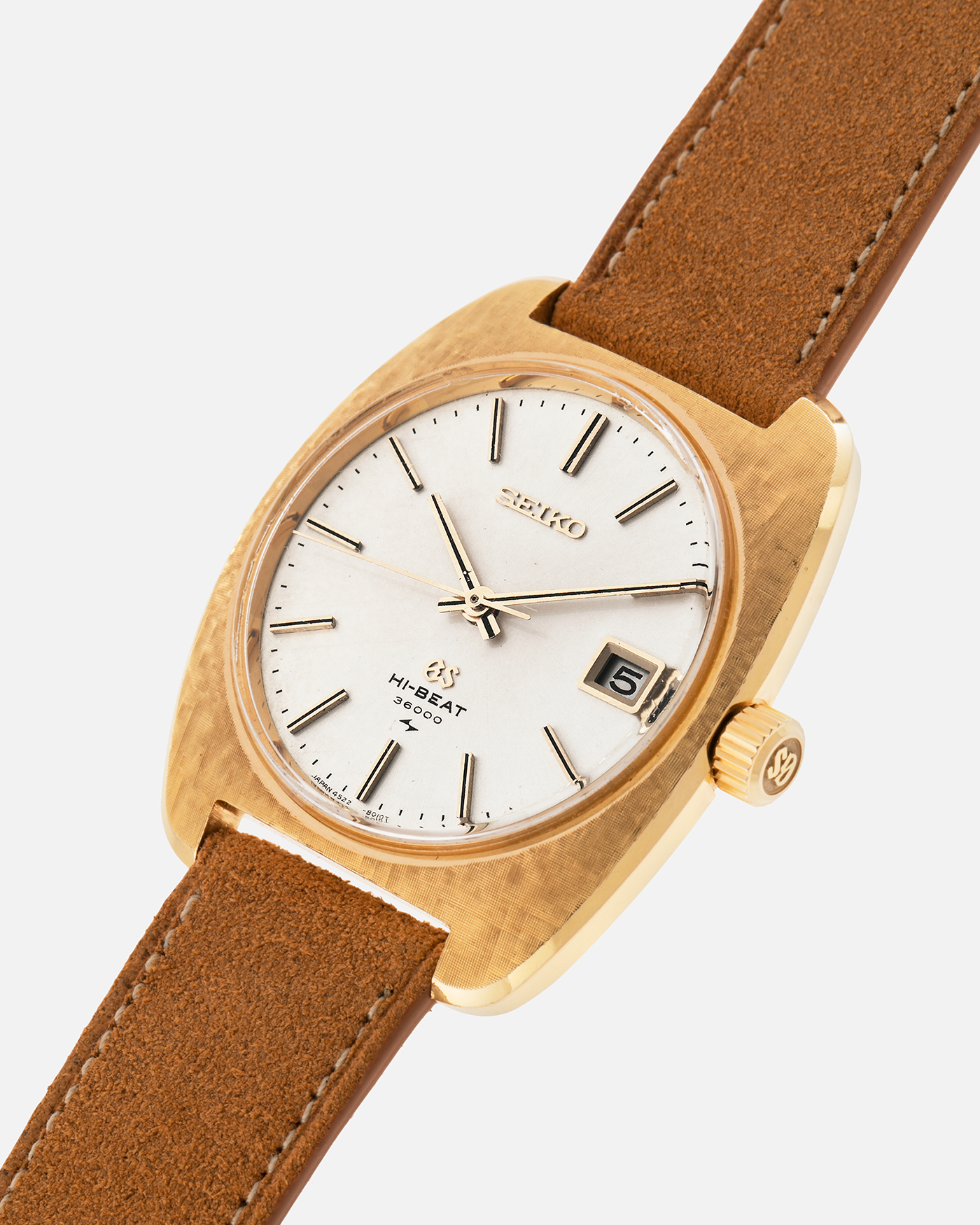 Brand: Grand Seiko
Year: Circa 1970’s
Reference Number: 4522-8010
Material: 18-carat Yellow Gold
Movement: Cal. 4520A
Case Diameter: 36mm Diameter 9mm Thickness
Lug Width: 18mm
Bracelet/Strap: Nostime Cognac Suede Strap and Unsigned Buckle