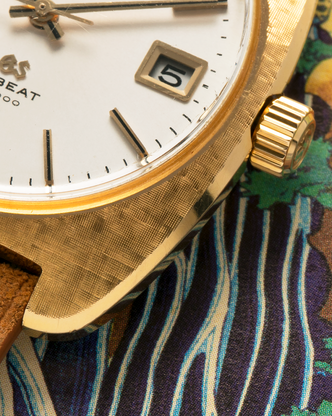 Brand: Grand Seiko
Year: Circa 1970’s
Reference Number: 4522-8010
Material: 18-carat Yellow Gold
Movement: Cal. 4520A
Case Diameter: 36mm Diameter 9mm Thickness
Lug Width: 18mm
Bracelet/Strap: Nostime Cognac Suede Strap and Unsigned Buckle