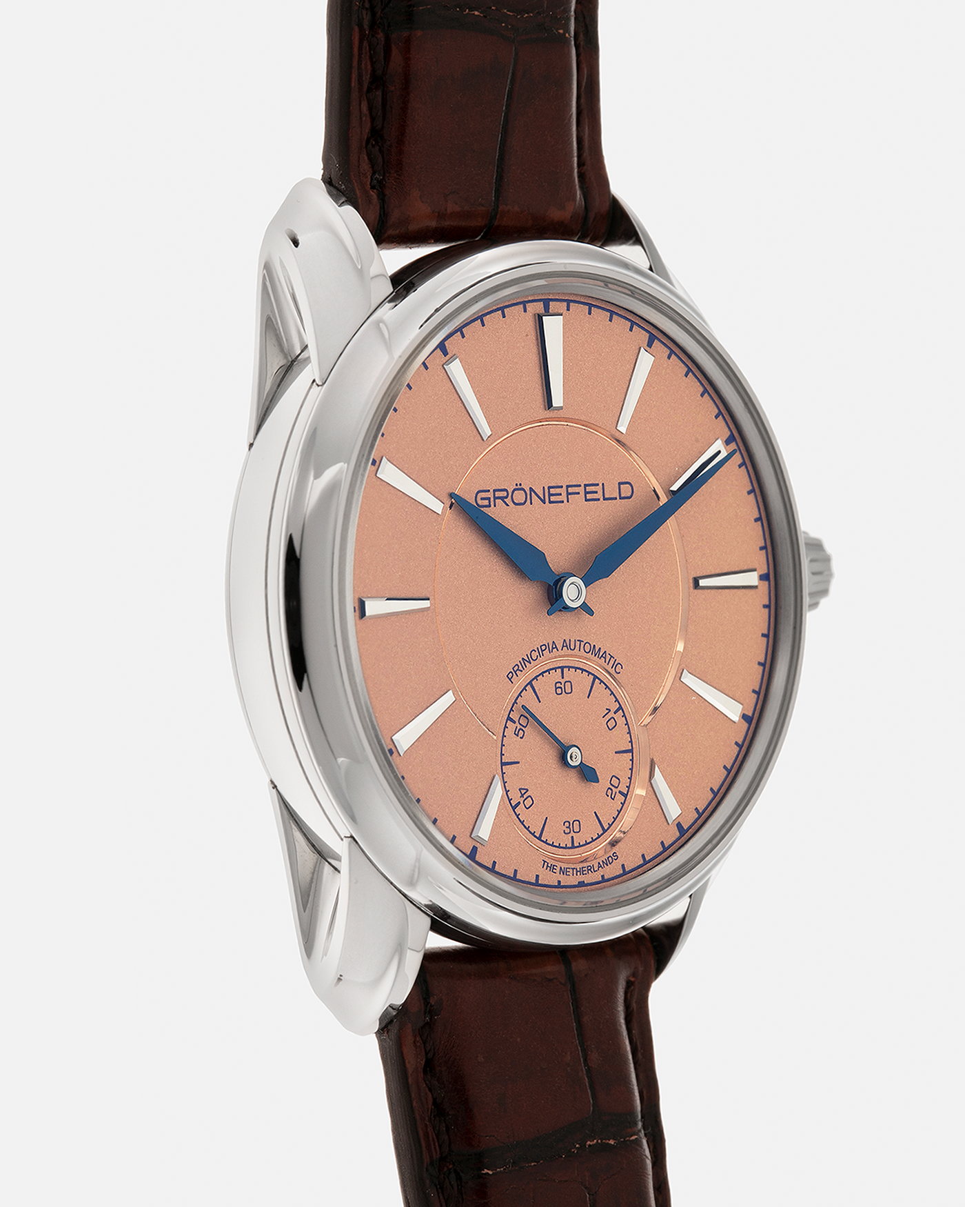 Brand: Grönefeld
Year: 2022
Model: 1941 Principia ‘Salmon’
Material: Stainless Steel
Movement: Grönefeld Cal. G-06, Self-Winding
Case Dimensions: 39.5mm x 10.5mm (Lug-to-Lug 47mm)
Lug Width: 20mm
Strap: Grönefeld Brown Alligator Leather Strap with Signed Stainless Steel Tang Buckle