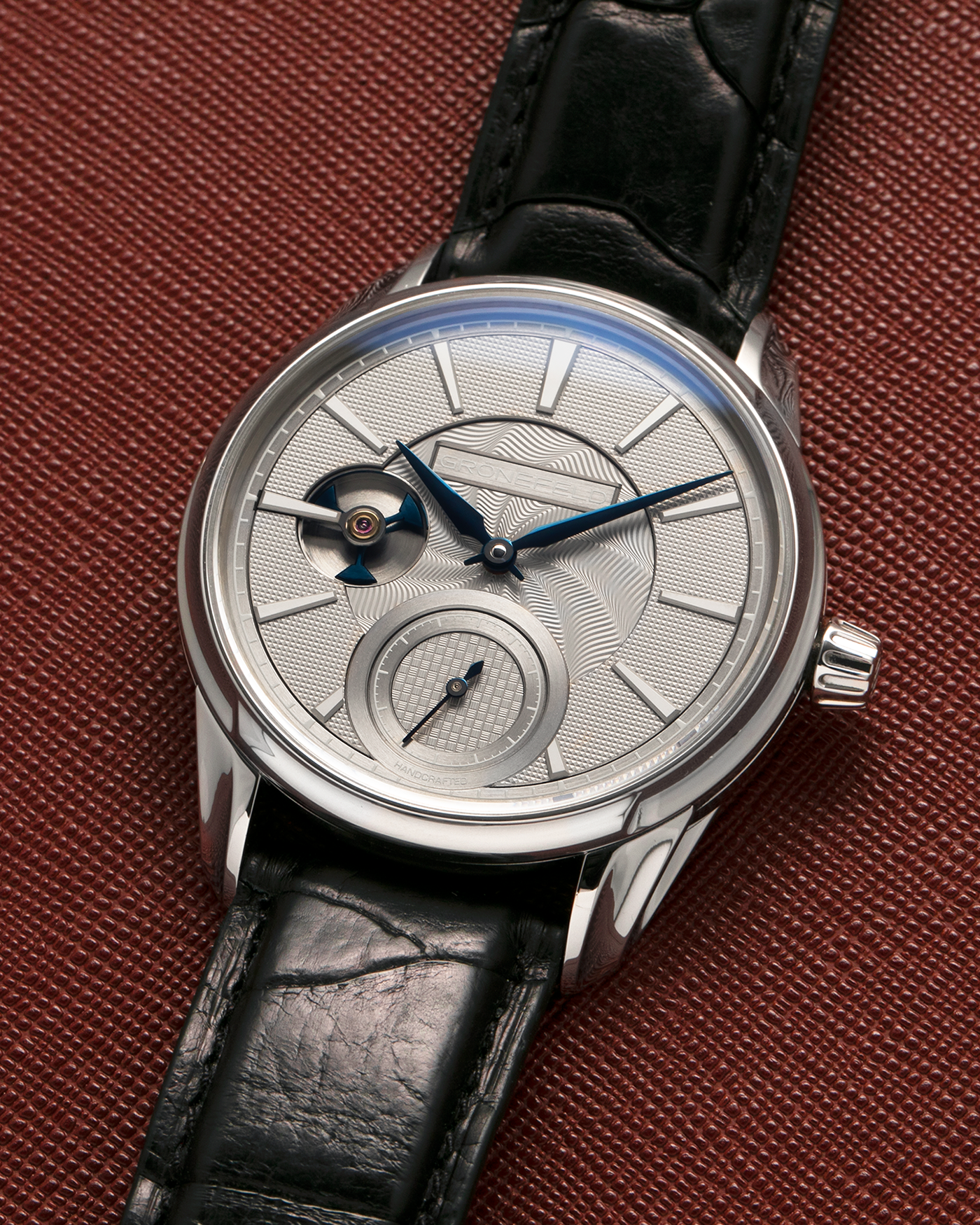 Brand: Grönefeld
Year: 2022
Model: 1941 Remontoire ‘Guilloché’, Pièce Unique
Material: Stainless Steel
Movement: Grönefeld Cal. G-05, Manual-Winding
Case Dimensions: 39.5mm x 10.5mm (Lug-to-Lug 47mm)
Lug Width: 20mm
Strap: Grönefeld Black Calf Leather Strap with Signed Stainless Steel Tang Buckle