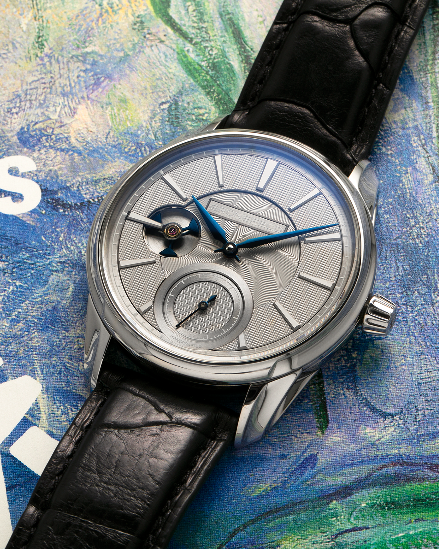 Brand: Grönefeld
Year: 2022
Model: 1941 Remontoire ‘Guilloché’, Pièce Unique
Material: Stainless Steel
Movement: Grönefeld Cal. G-05, Manual-Winding
Case Dimensions: 39.5mm x 10.5mm (Lug-to-Lug 47mm)
Lug Width: 20mm
Strap: Grönefeld Black Calf Leather Strap with Signed Stainless Steel Tang Buckle