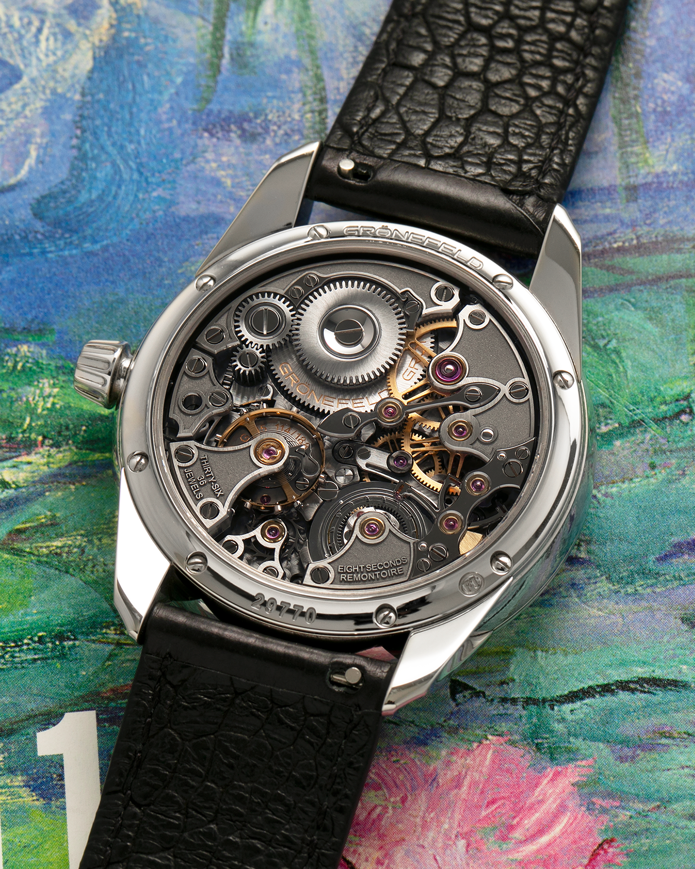 Brand: Grönefeld
Year: 2022
Model: 1941 Remontoire ‘Guilloché’, Pièce Unique
Material: Stainless Steel
Movement: Grönefeld Cal. G-05, Manual-Winding
Case Dimensions: 39.5mm x 10.5mm (Lug-to-Lug 47mm)
Lug Width: 20mm
Strap: Grönefeld Black Calf Leather Strap with Signed Stainless Steel Tang Buckle