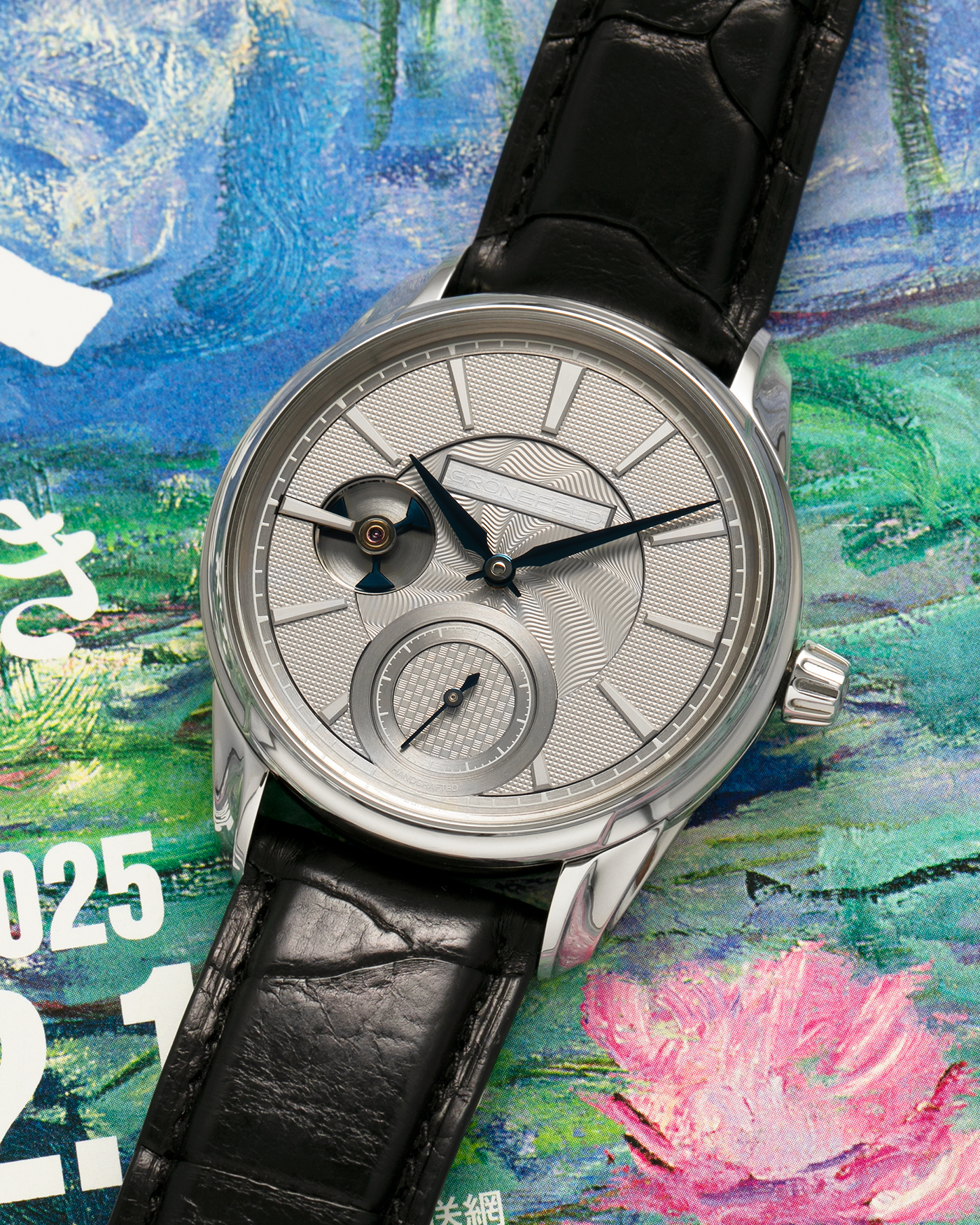 Brand: Grönefeld
Year: 2022
Model: 1941 Remontoire ‘Guilloché’, Pièce Unique
Material: Stainless Steel
Movement: Grönefeld Cal. G-05, Manual-Winding
Case Dimensions: 39.5mm x 10.5mm (Lug-to-Lug 47mm)
Lug Width: 20mm
Strap: Grönefeld Black Calf Leather Strap with Signed Stainless Steel Tang Buckle