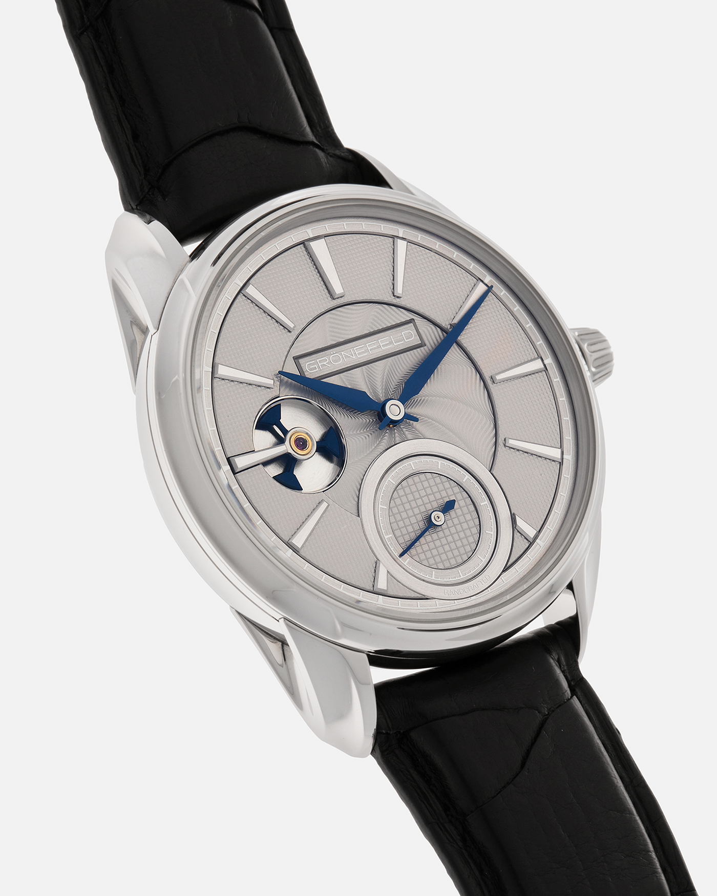 Brand: Grönefeld
Year: 2022
Model: 1941 Remontoire ‘Guilloché’, Pièce Unique
Material: Stainless Steel
Movement: Grönefeld Cal. G-05, Manual-Winding
Case Dimensions: 39.5mm x 10.5mm (Lug-to-Lug 47mm)
Lug Width: 20mm
Strap: Grönefeld Black Calf Leather Strap with Signed Stainless Steel Tang Buckle