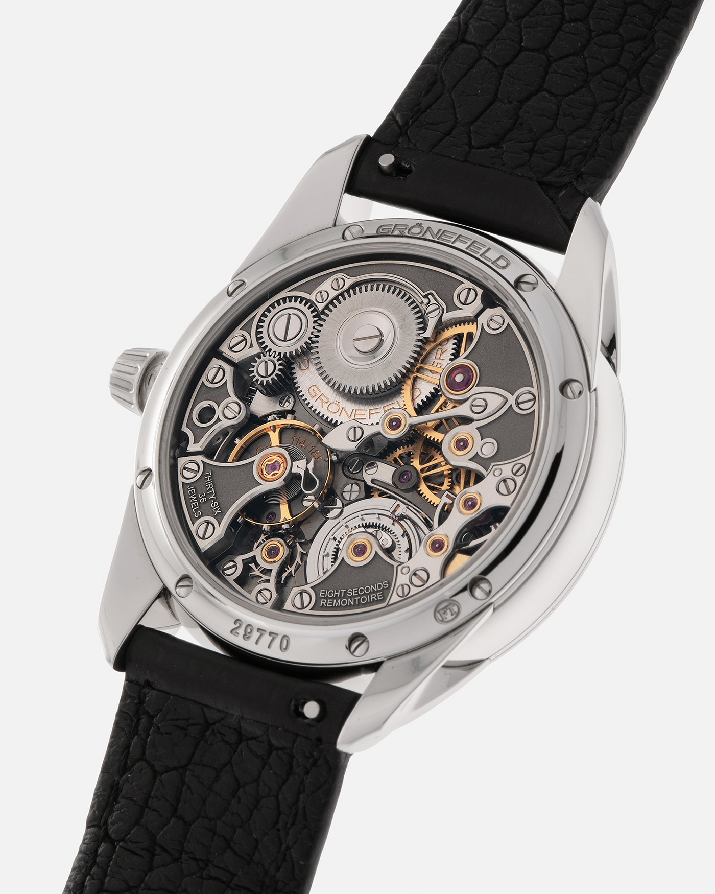 Brand: Grönefeld
Year: 2022
Model: 1941 Remontoire ‘Guilloché’, Pièce Unique
Material: Stainless Steel
Movement: Grönefeld Cal. G-05, Manual-Winding
Case Dimensions: 39.5mm x 10.5mm (Lug-to-Lug 47mm)
Lug Width: 20mm
Strap: Grönefeld Black Calf Leather Strap with Signed Stainless Steel Tang Buckle