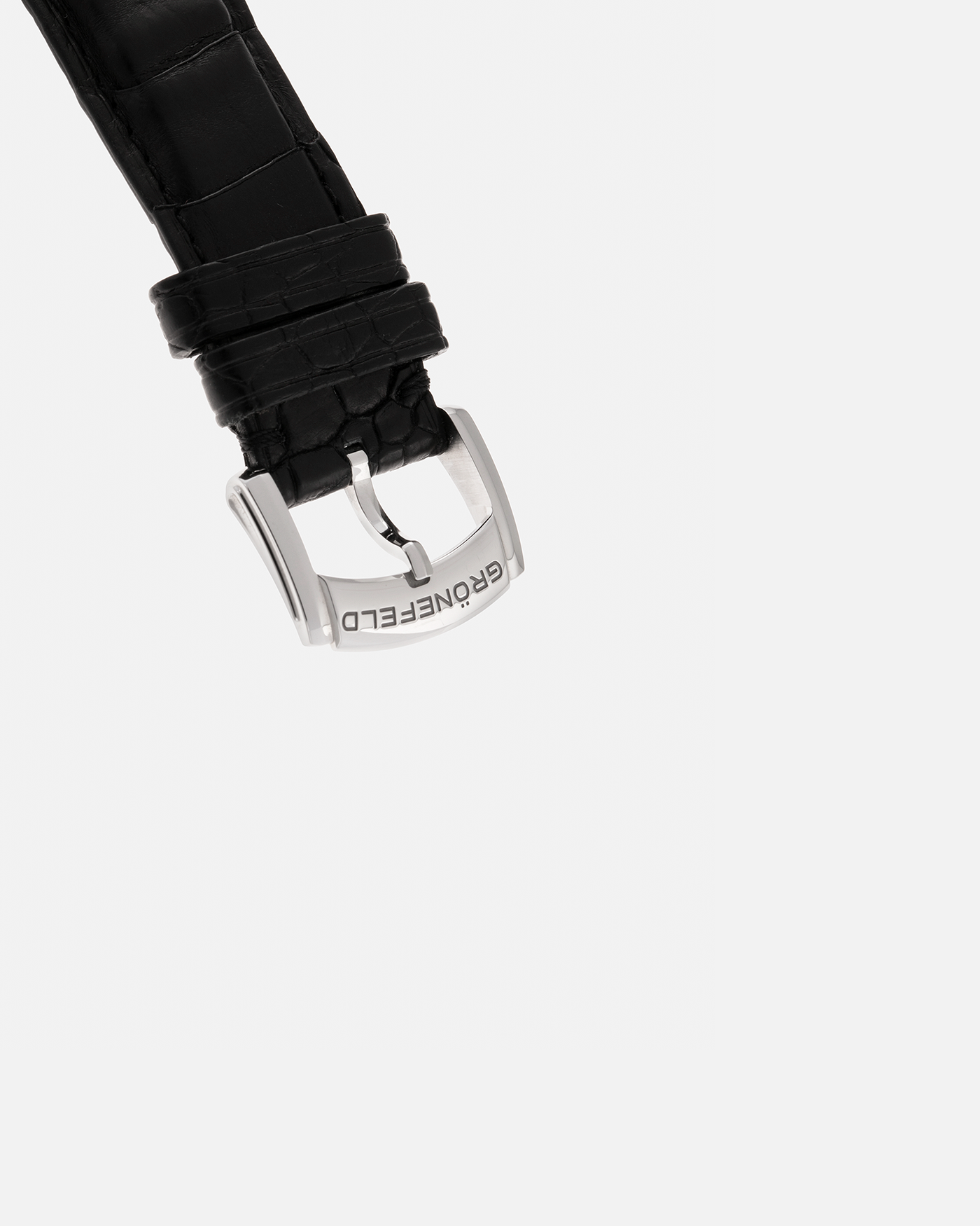 Brand: Grönefeld
Year: 2022
Model: 1941 Remontoire ‘Guilloché’, Pièce Unique
Material: Stainless Steel
Movement: Grönefeld Cal. G-05, Manual-Winding
Case Dimensions: 39.5mm x 10.5mm (Lug-to-Lug 47mm)
Lug Width: 20mm
Strap: Grönefeld Black Calf Leather Strap with Signed Stainless Steel Tang Buckle