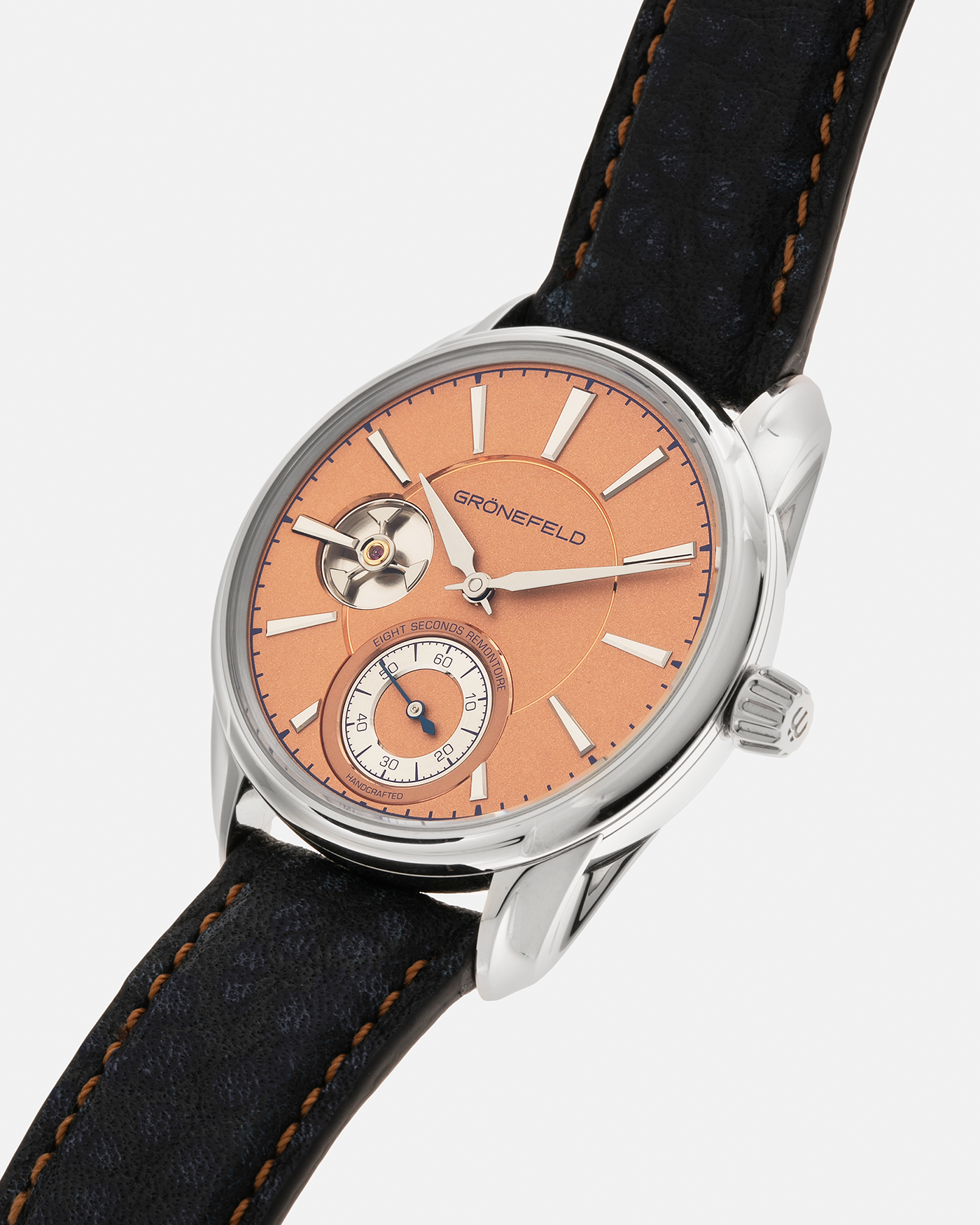 Brand: Grönefeld Year: XXXX Model: 1941 Remontoire ‘Salmon’ Material: Stainless Steel Movement: Grönefeld Cal. G-05, Manual-Winding Case Dimensions: 39.5mm x  10.5mm Lug Width: 20mm Strap: Grönefeld Blue Ostrich / Dutch Orange Leather Strap with Signed Stainless Steel 916L Tang Buckle