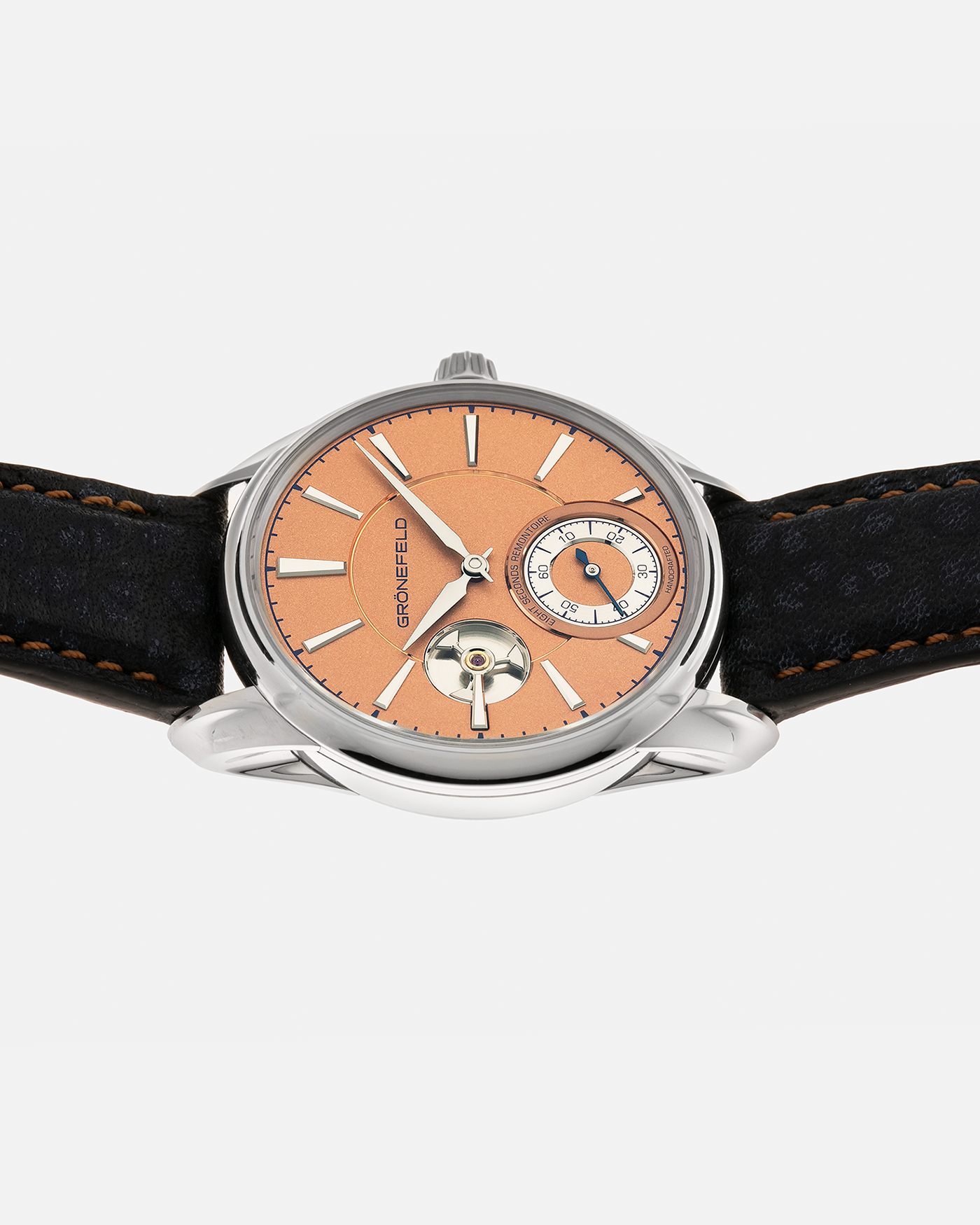 Brand: Grönefeld Year: XXXX Model: 1941 Remontoire ‘Salmon’ Material: Stainless Steel Movement: Grönefeld Cal. G-05, Manual-Winding Case Dimensions: 39.5mm x  10.5mm Lug Width: 20mm Strap: Grönefeld Blue Ostrich / Dutch Orange Leather Strap with Signed Stainless Steel 916L Tang Buckle