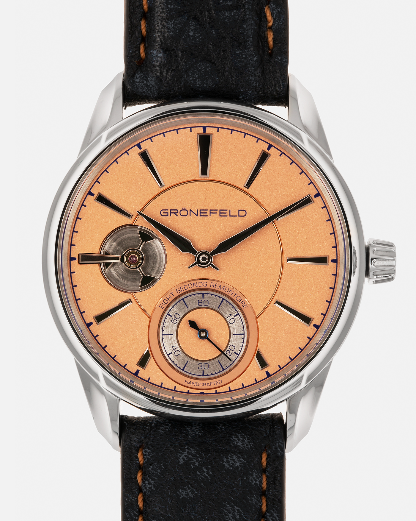 Brand: Grönefeld Year: XXXX Model: 1941 Remontoire ‘Salmon’ Material: Stainless Steel Movement: Grönefeld Cal. G-05, Manual-Winding Case Dimensions: 39.5mm x  10.5mm Lug Width: 20mm Strap: Grönefeld Blue Ostrich / Dutch Orange Leather Strap with Signed Stainless Steel 916L Tang Buckle