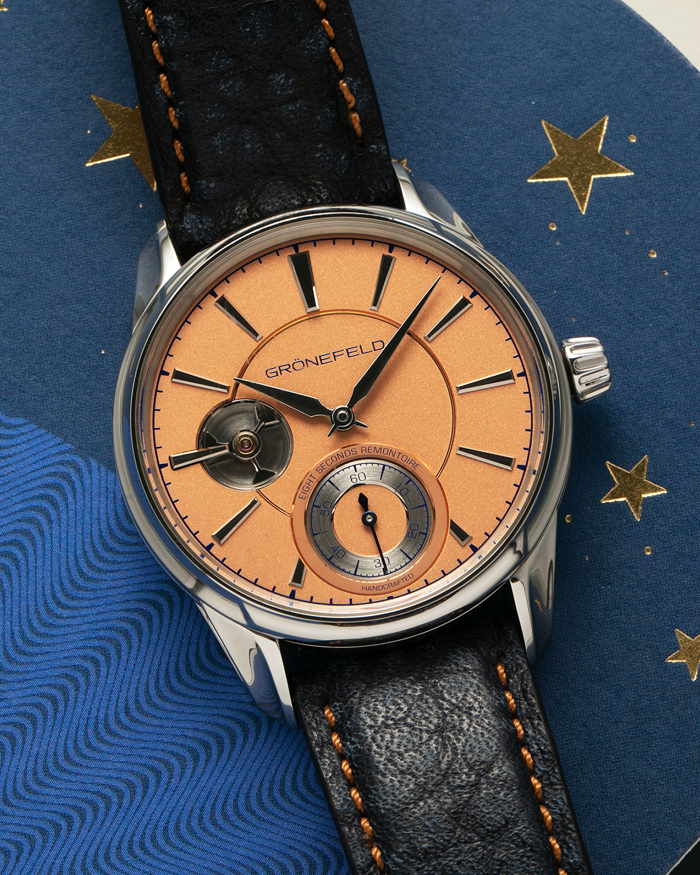 Brand: Grönefeld Year: XXXX Model: 1941 Remontoire ‘Salmon’ Material: Stainless Steel Movement: Grönefeld Cal. G-05, Manual-Winding Case Dimensions: 39.5mm x  10.5mm Lug Width: 20mm Strap: Grönefeld Blue Ostrich / Dutch Orange Leather Strap with Signed Stainless Steel 916L Tang Buckle