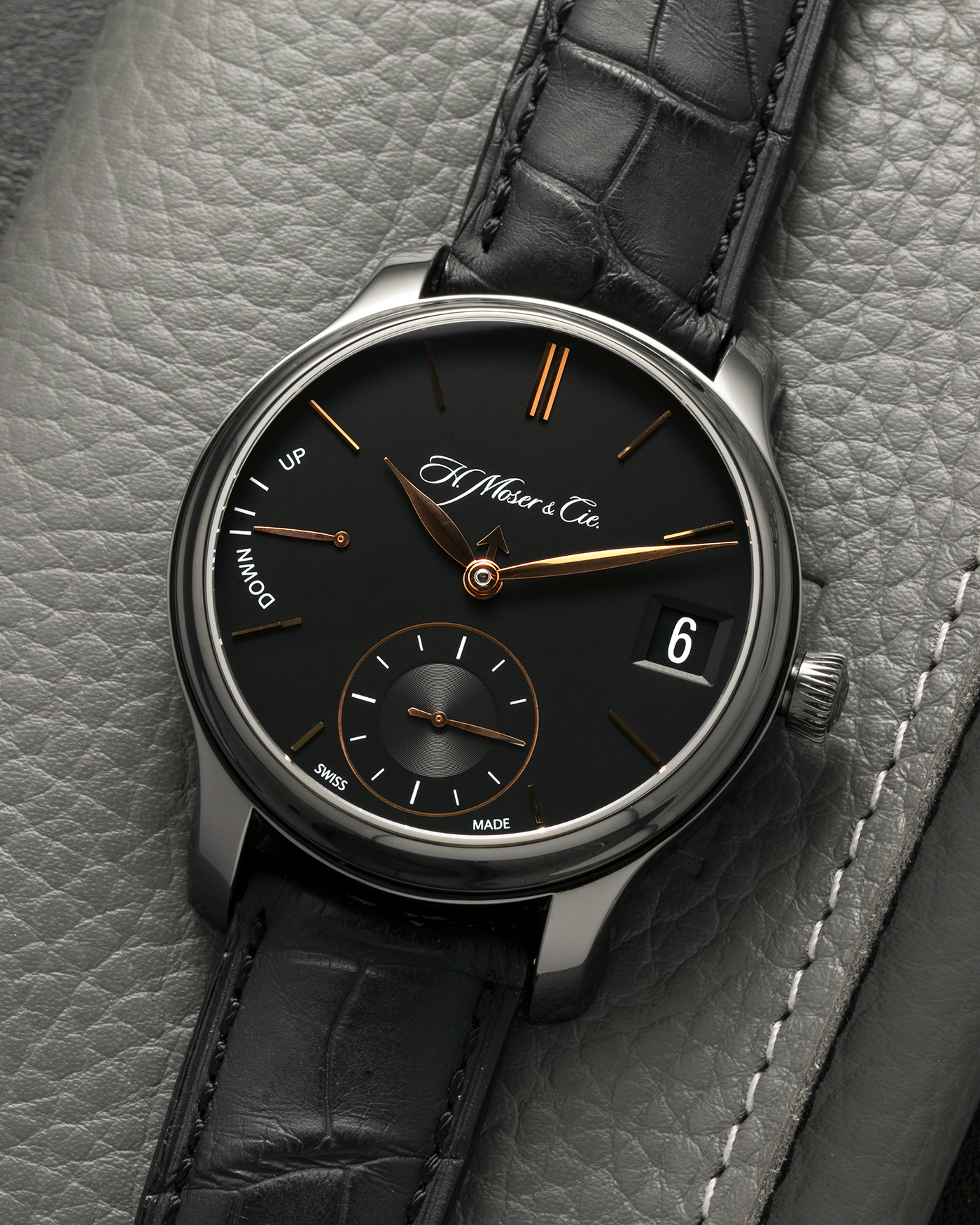 Brand: H. Moser & Cie
Year: Approximately 2016 (Guarantee Card Undated)
Model: Endeavour Perpetual Calendar Black Edition
Reference Number: 341.050-020
Material: DLC-Coated Grade 5 Titanium
Movement: H. Moser Cal. HMC 341, Manual-Winding
Case Dimensions: 40.8mm x 11.1 (Lug-to-Lug 47mm)
Lug Width: 20mm
Strap: H. Moser Black Calf Leather Strap with Signed DLC-Coated Titanium Tang Buckle
