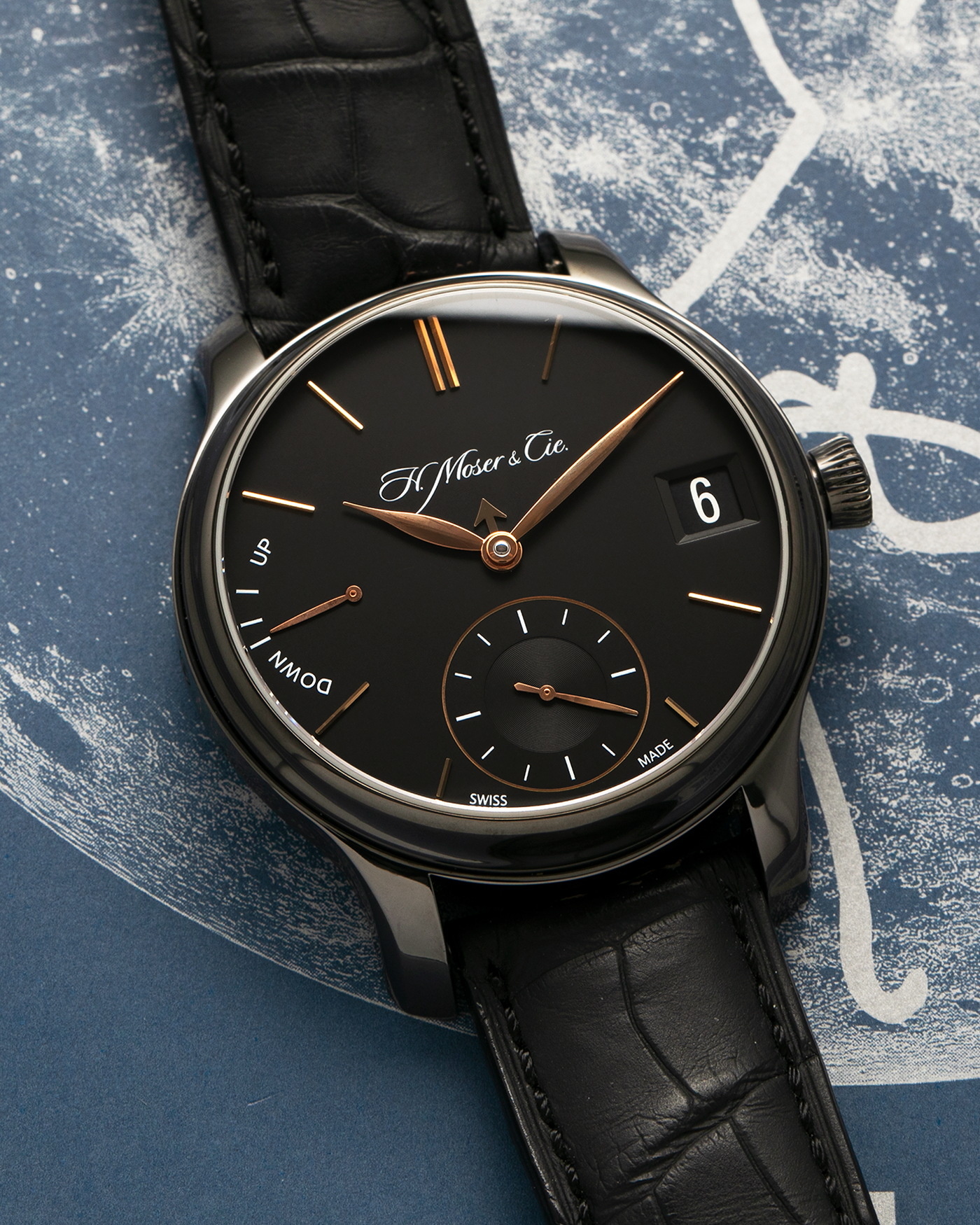 Brand: H. Moser & Cie
Year: Approximately 2016 (Guarantee Card Undated)
Model: Endeavour Perpetual Calendar Black Edition
Reference Number: 341.050-020
Material: DLC-Coated Grade 5 Titanium
Movement: H. Moser Cal. HMC 341, Manual-Winding
Case Dimensions: 40.8mm x 11.1 (Lug-to-Lug 47mm)
Lug Width: 20mm
Strap: H. Moser Black Calf Leather Strap with Signed DLC-Coated Titanium Tang Buckle