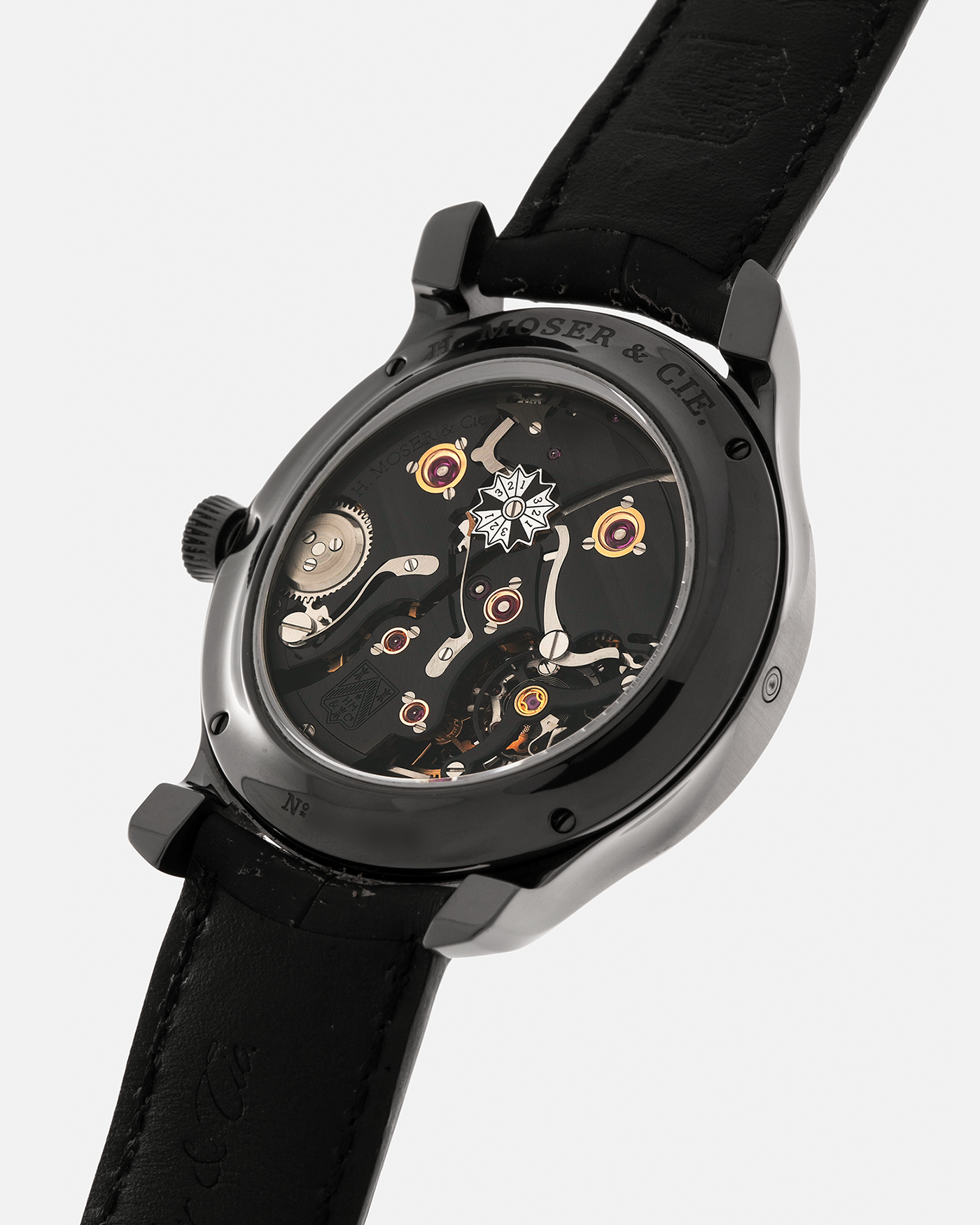 Brand: H. Moser & Cie
Year: Approximately 2016 (Guarantee Card Undated)
Model: Endeavour Perpetual Calendar Black Edition
Reference Number: 341.050-020
Material: DLC-Coated Grade 5 Titanium
Movement: H. Moser Cal. HMC 341, Manual-Winding
Case Dimensions: 40.8mm x 11.1 (Lug-to-Lug 47mm)
Lug Width: 20mm
Strap: H. Moser Black Calf Leather Strap with Signed DLC-Coated Titanium Tang Buckle