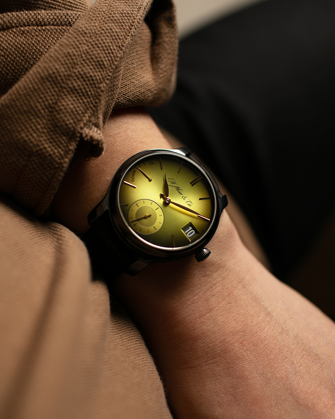 Brand: H.Moser & Cie Year: 2020 Model: Endeavour Perpetual Calendar Yellow-Green Fumé Reference Number: 1344-0504 Material: DLC Coated Titanium Movement: H. Moser Cal. HMC 341, Manual-Winding Case Diameter: 40.8mm Lug Width: 20mm Strap: H. Moser & Cie Black Alligator Leather Strap with Signed DLC Coated Titanium Tang Buckle