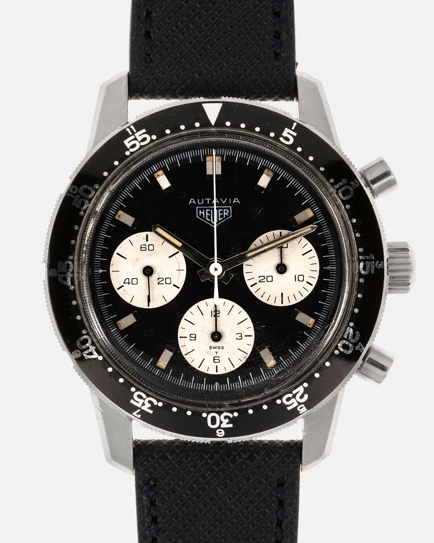 Brand: Heuer Year: 1960’s Model: Autavia Reference Number: 2446C MH (Compressor Case, Minute Hour Bezel) Serial Number: 108644 Material: Stainless Steel Movement: Valjoux Cal. 72, Manual-Winding Case Diameter: 40mm Lug Width: 20mm Strap: Molequin Navy Textured Calf Leather Strap