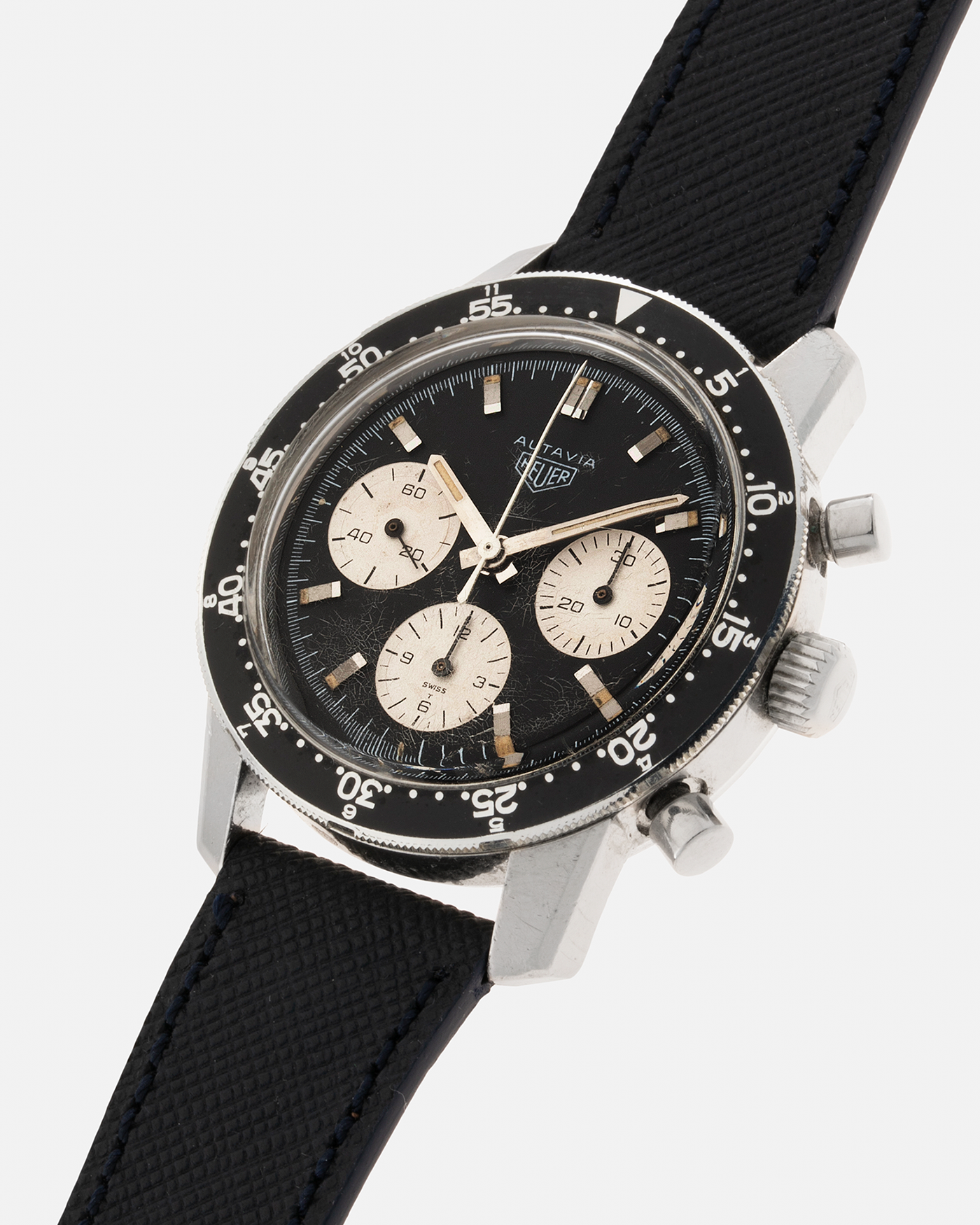 Brand: Heuer Year: 1960’s Model: Autavia Reference Number: 2446C MH (Compressor Case, Minute Hour Bezel) Serial Number: 108644 Material: Stainless Steel Movement: Valjoux Cal. 72, Manual-Winding Case Diameter: 40mm Lug Width: 20mm Strap: Molequin Navy Textured Calf Leather Strap