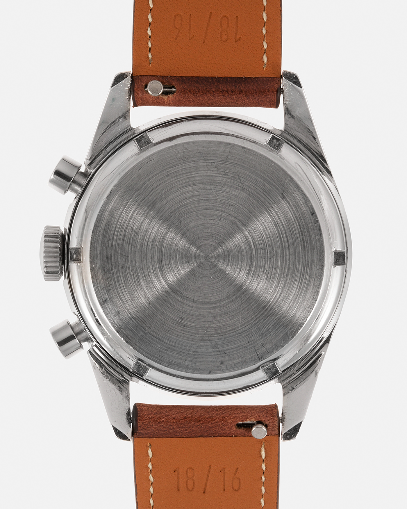 Brand: Heuer Year: 1960’s Model: Carrera Reference Number: 2447N Serial Number: 69XXX Material: Stainless Steel Movement: Valjoux 72 Case Diameter: 36mm Lug Width: 18mm Strap: Nostime Medium Brown Calf Leather Strap with Stainless Steel Tang Buckle