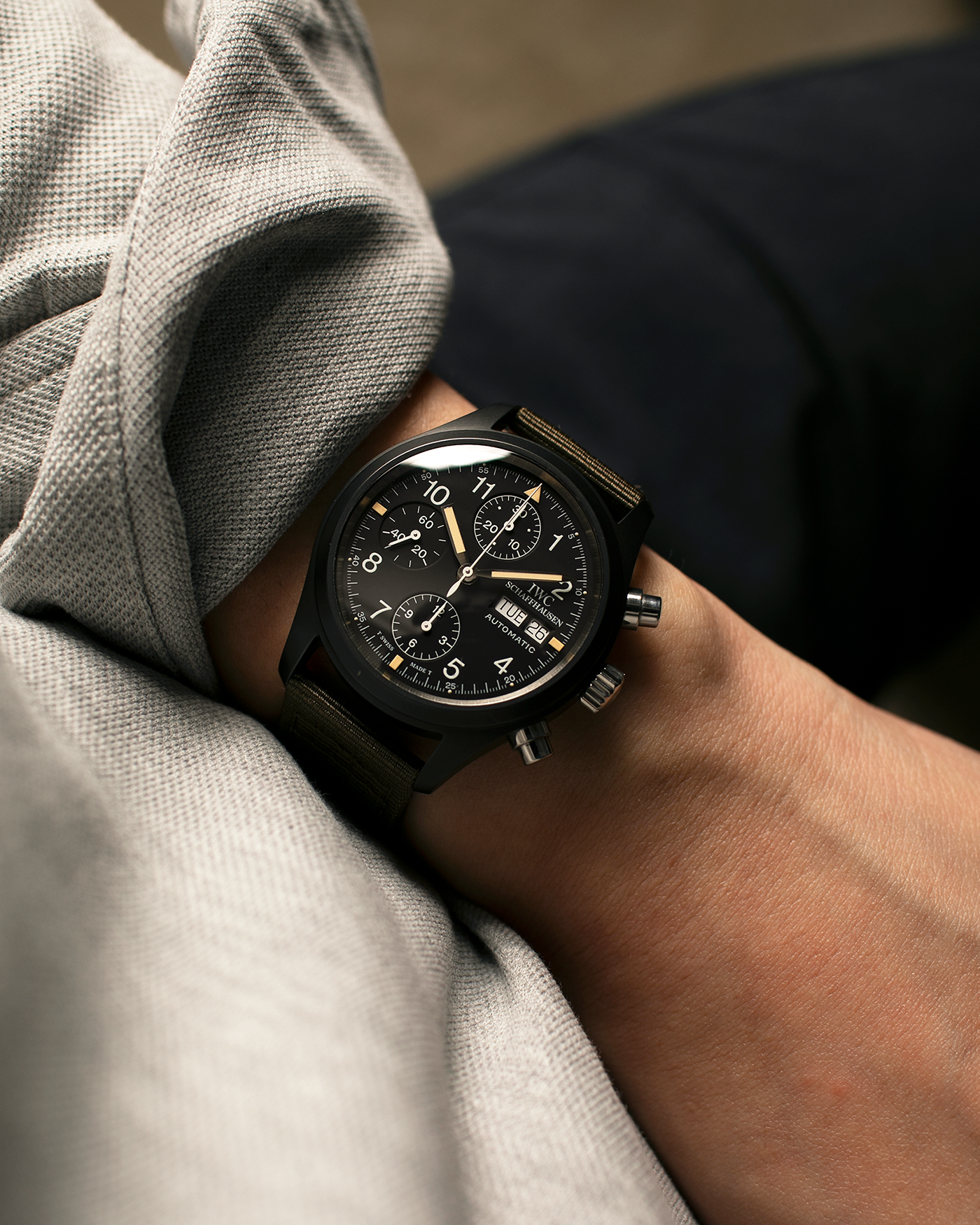 Brand: IWC
Year: Mid-1990s
Model: Fliegerchronograph ‘Keramik’
Reference: 3705
Material: Ceramic and Stainless Steel Case
Movement: Valjoux Cal. 7750 (Modified by IWC), Self-Winding
Case Dimensions: 39mm x 14.8mm (47.7mm Lug-to-Lug)
Lug Width: 20mm
Strap: IWC Army Green Canvas Strap with Signed Stainless Steel Tang Buckle