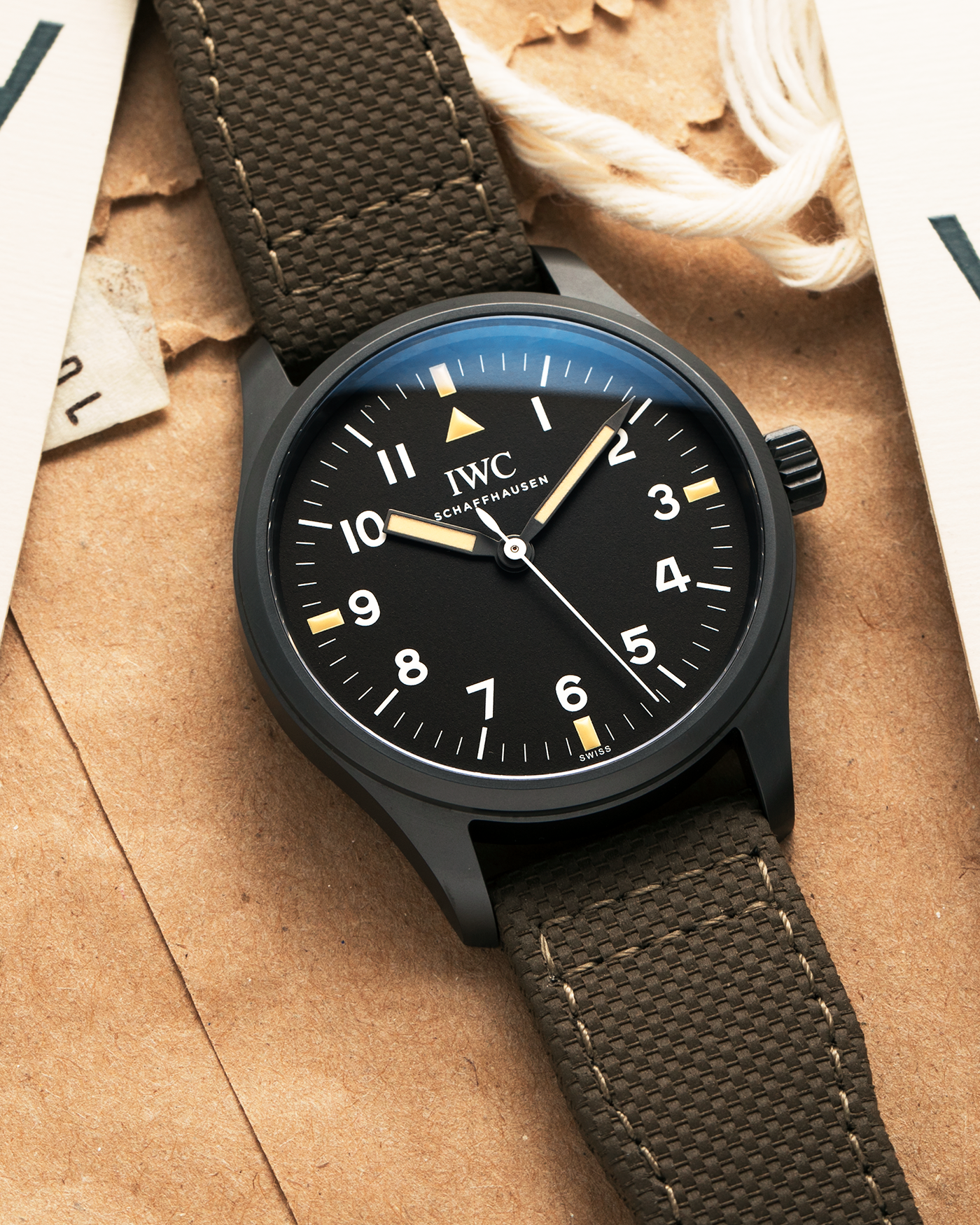 Brand: IWC
Year: 2019
Model: Mark XVIII ‘Hodinkee’, Limited to 500 pieces
Reference Number: IW324801
Material: Ceratanium
Movement: IWC Cal. 35100, Self-Winding
Case Dimensions: 39mm x 10.6mm (Lug-to-Lug 48mm)
Lug Width: 20mm
Strap: IWC Dark Olive Textile Strap with Signed Ceratanium Tang Buckle