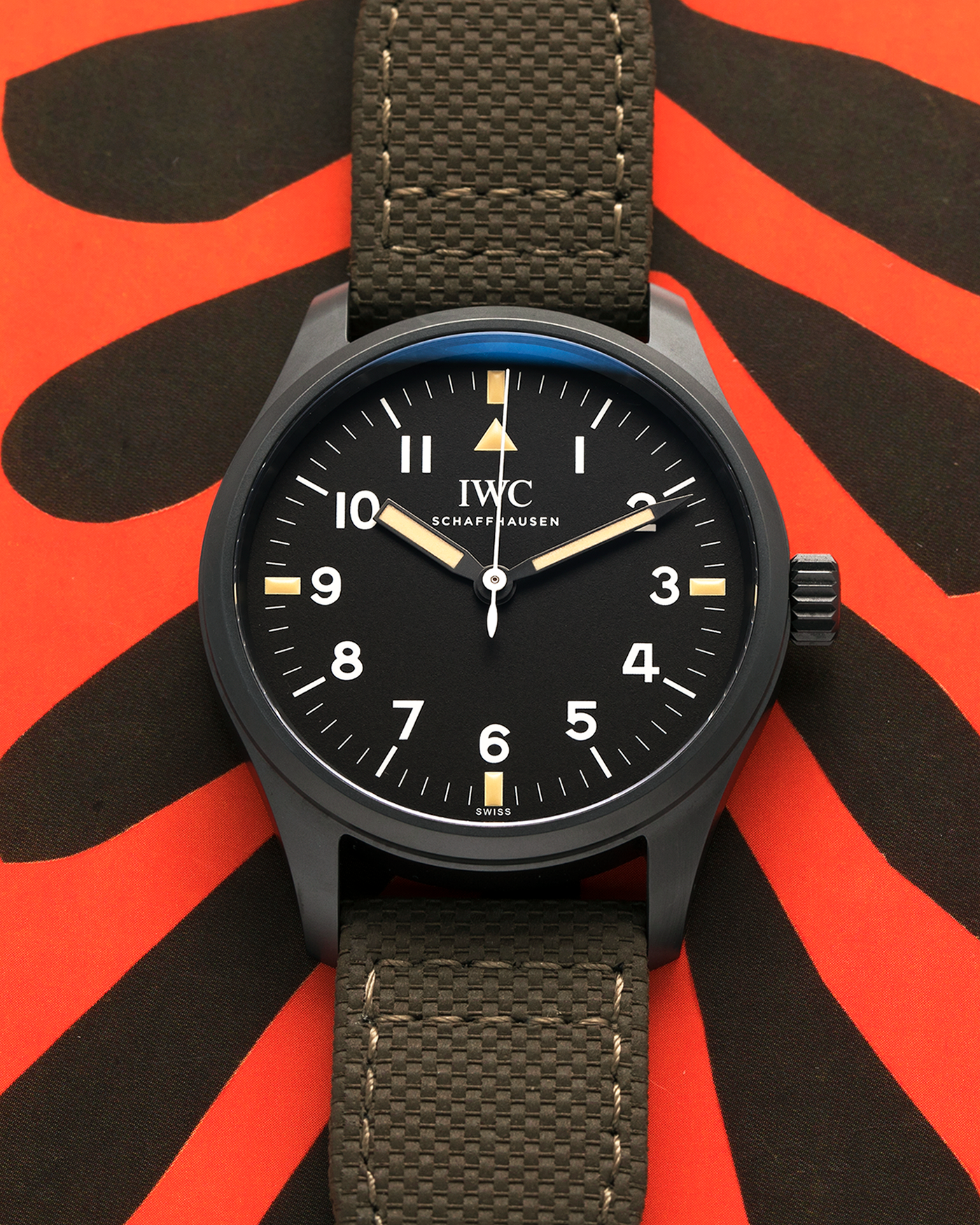 Brand: IWC
Year: 2019
Model: Mark XVIII ‘Hodinkee’, Limited to 500 pieces
Reference Number: IW324801
Material: Ceratanium
Movement: IWC Cal. 35100, Self-Winding
Case Dimensions: 39mm x 10.6mm (Lug-to-Lug 48mm)
Lug Width: 20mm
Strap: IWC Dark Olive Textile Strap with Signed Ceratanium Tang Buckle
