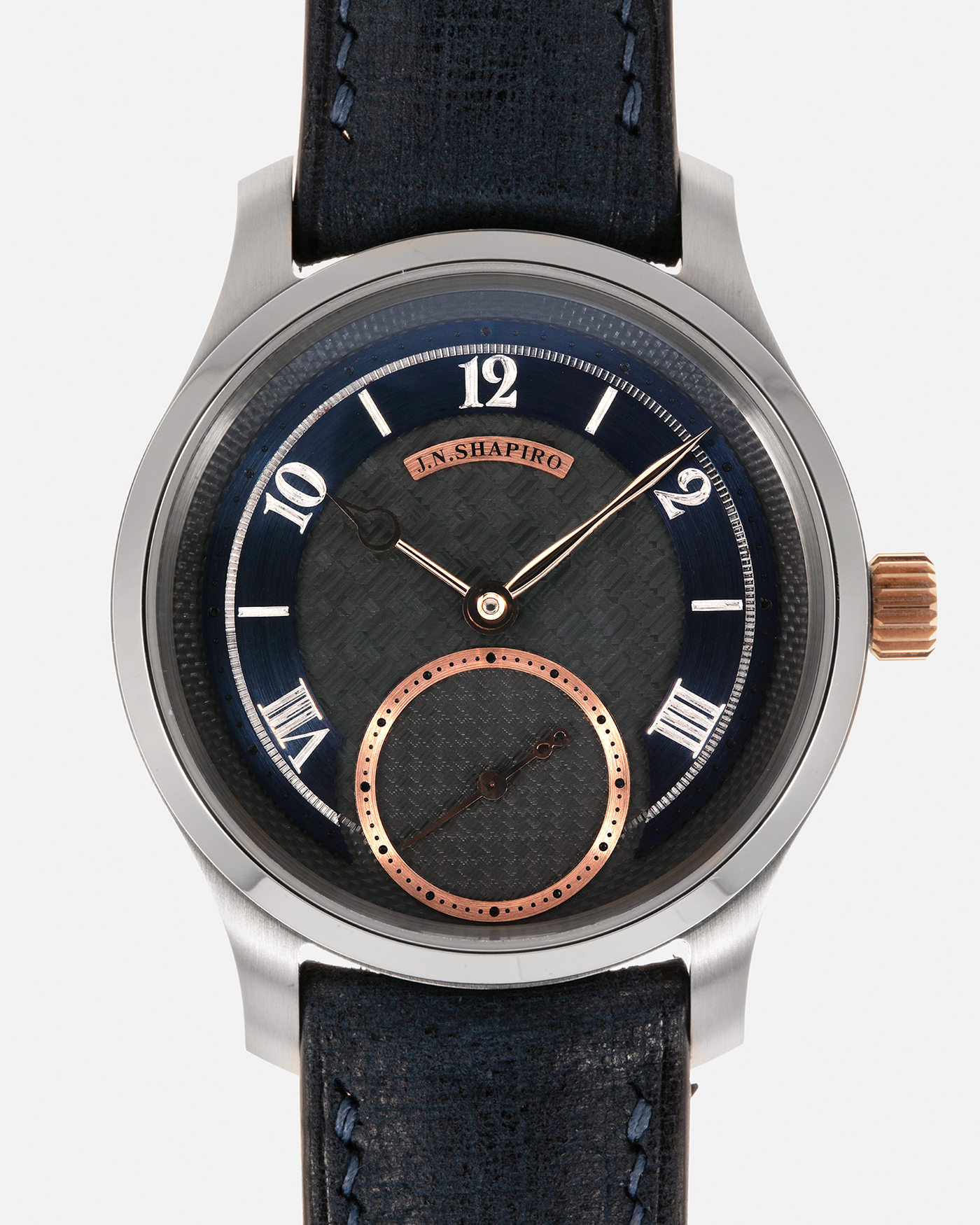 Brand: J.N. Shapiro
Year: 2023
Model: Infinity Series 1.5
Serial Number: S.1
Material: Stainless Steel Case, Black Zirconium Dial, Rose Gold Hands, Crown and Inlays
Movement: UWD Cal. 33.1, Manual-Winding
Case Dimensions: 39mm x 9.75mm (47mm Lug-to-Lug)
Lug Width: 20mm
Strap: J.N. Shapiro x Delugs Navy Blue Leather Strap with Signed Stainless Steel Tang Buckle

