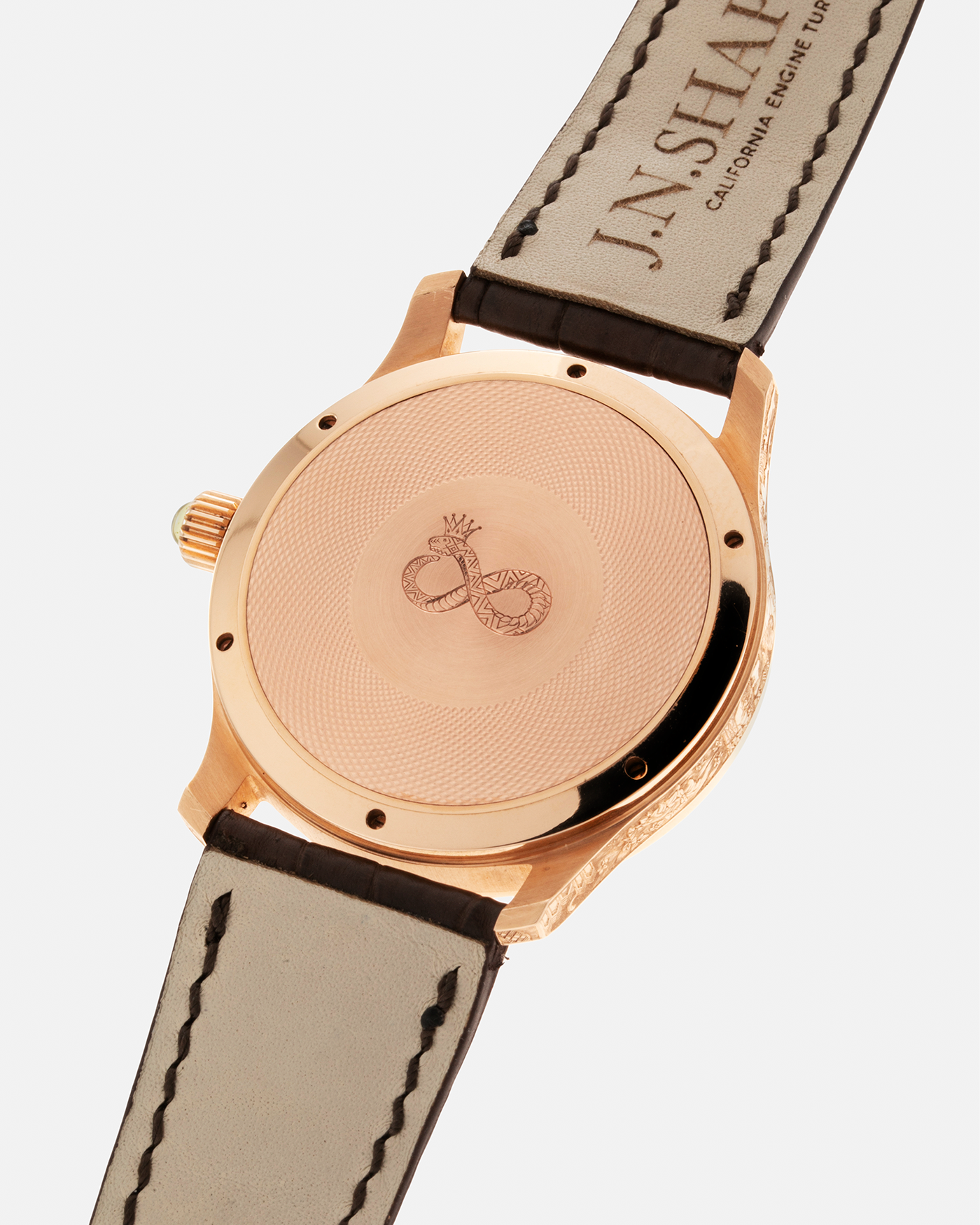 Brand: J.N. Shapiro Year: 2020 Model: Infinity Series (Piece Unique) Material: 18-carat Rose Gold Case, Ruthenium Dial Movement: UWD Cal. 33.1, Manual-Winding Case Diameter: 40mm Lug Width: 22mm Strap: J.N. Shapiro Dark Brown Alligator Strap with Custom Engraved 18-carat Rose Gold Tang Buckle