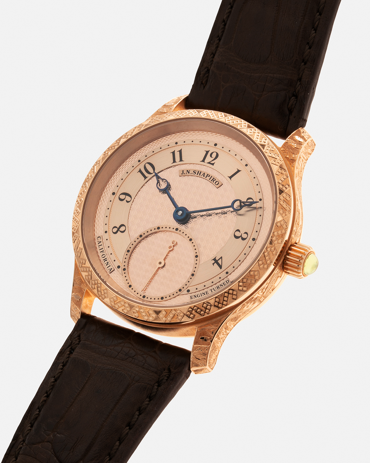 Brand: J.N. Shapiro Year: 2020 Model: Infinity Series (Piece Unique) Material: 18-carat Rose Gold Case, Ruthenium Dial Movement: UWD Cal. 33.1, Manual-Winding Case Diameter: 40mm Lug Width: 22mm Strap: J.N. Shapiro Dark Brown Alligator Strap with Custom Engraved 18-carat Rose Gold Tang Buckle