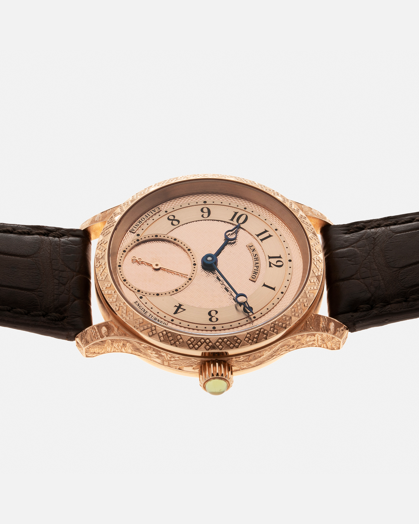 Brand: J.N. Shapiro Year: 2020 Model: Infinity Series (Piece Unique) Material: 18-carat Rose Gold Case, Ruthenium Dial Movement: UWD Cal. 33.1, Manual-Winding Case Diameter: 40mm Lug Width: 22mm Strap: J.N. Shapiro Dark Brown Alligator Strap with Custom Engraved 18-carat Rose Gold Tang Buckle