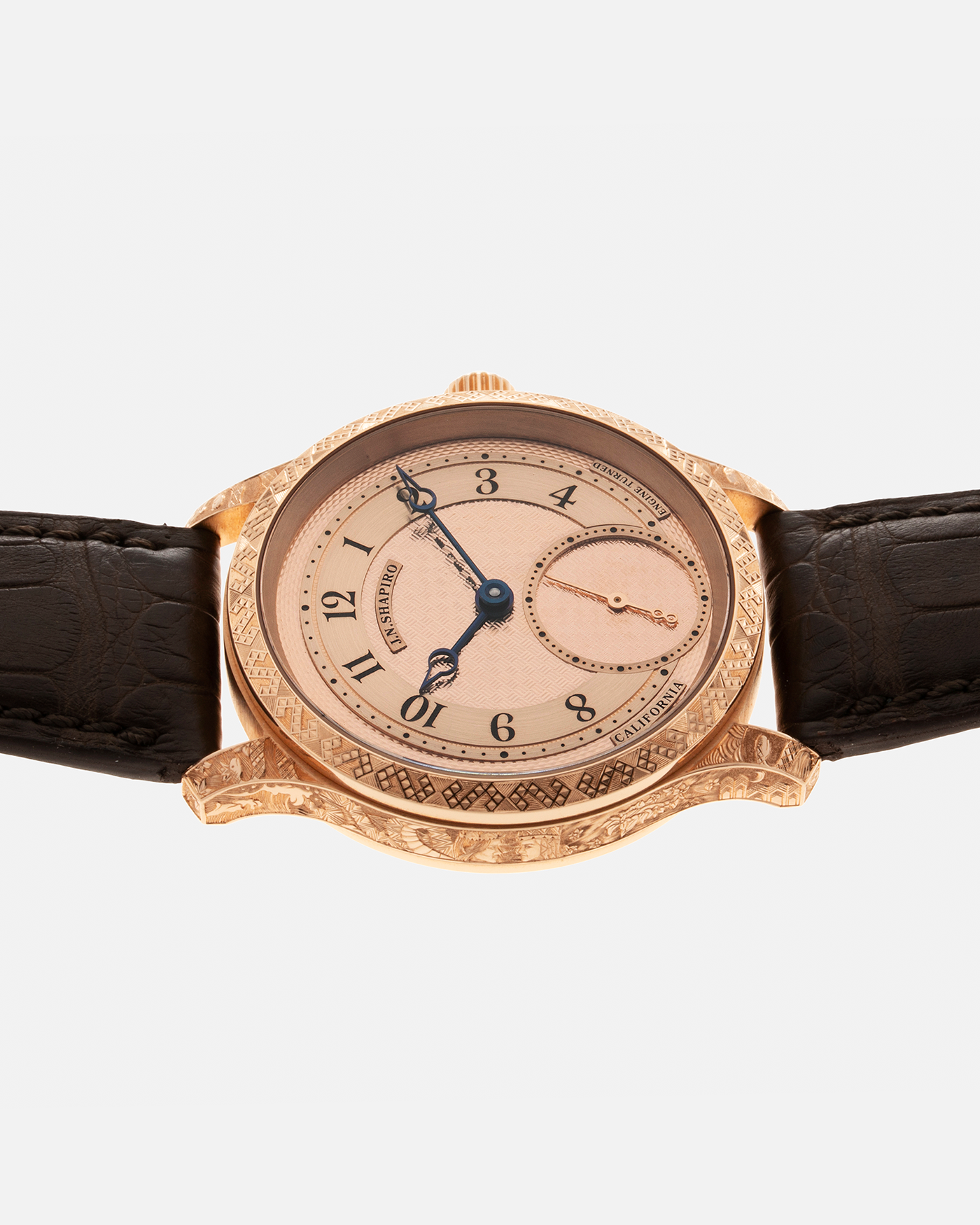 Brand: J.N. Shapiro Year: 2020 Model: Infinity Series (Piece Unique) Material: 18-carat Rose Gold Case, Ruthenium Dial Movement: UWD Cal. 33.1, Manual-Winding Case Diameter: 40mm Lug Width: 22mm Strap: J.N. Shapiro Dark Brown Alligator Strap with Custom Engraved 18-carat Rose Gold Tang Buckle