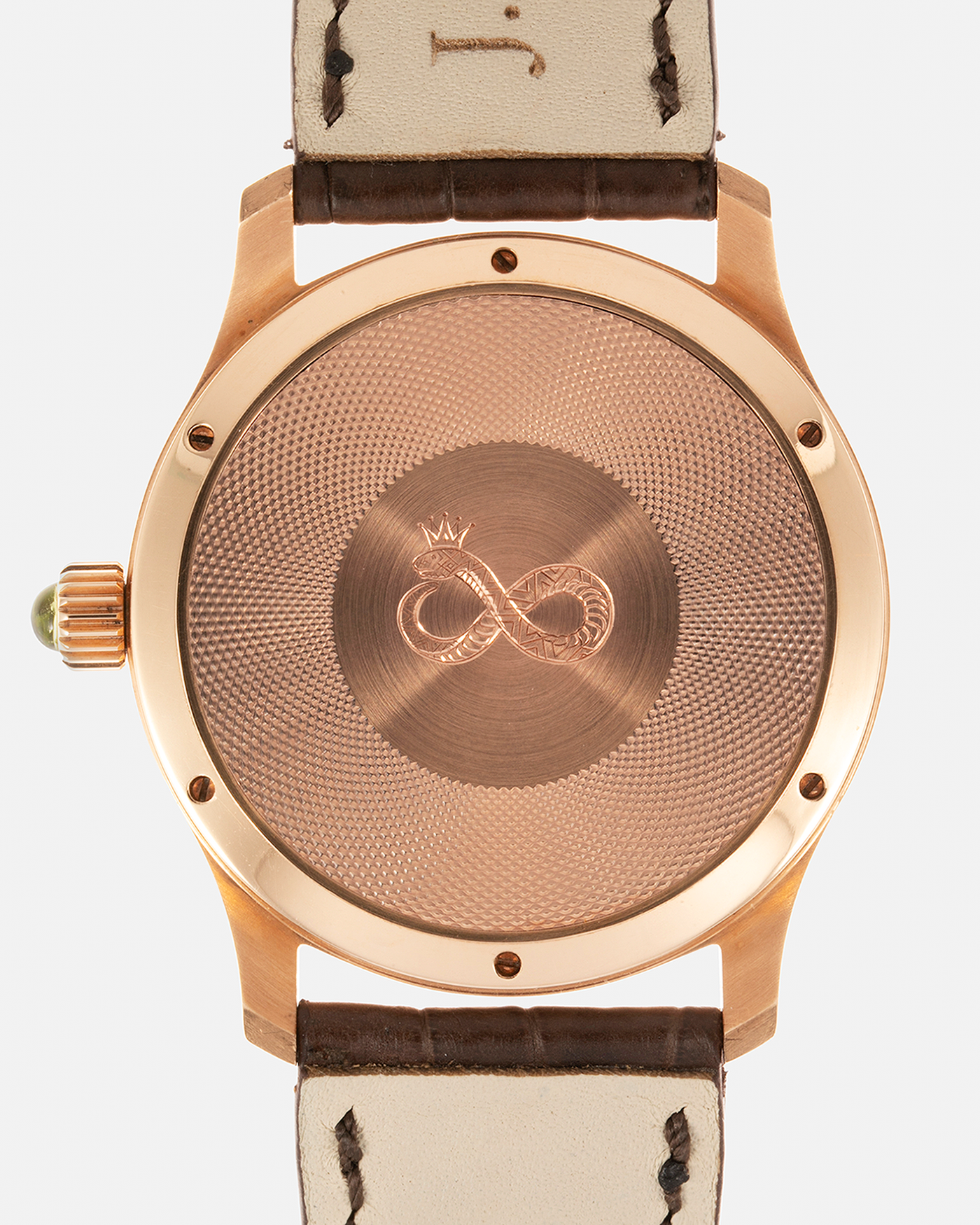 Brand: J.N. Shapiro Year: 2020 Model: Infinity Series (Piece Unique) Material: 18-carat Rose Gold Case, Ruthenium Dial Movement: UWD Cal. 33.1, Manual-Winding Case Diameter: 40mm Lug Width: 22mm Strap: J.N. Shapiro Dark Brown Alligator Strap with Custom Engraved 18-carat Rose Gold Tang Buckle
