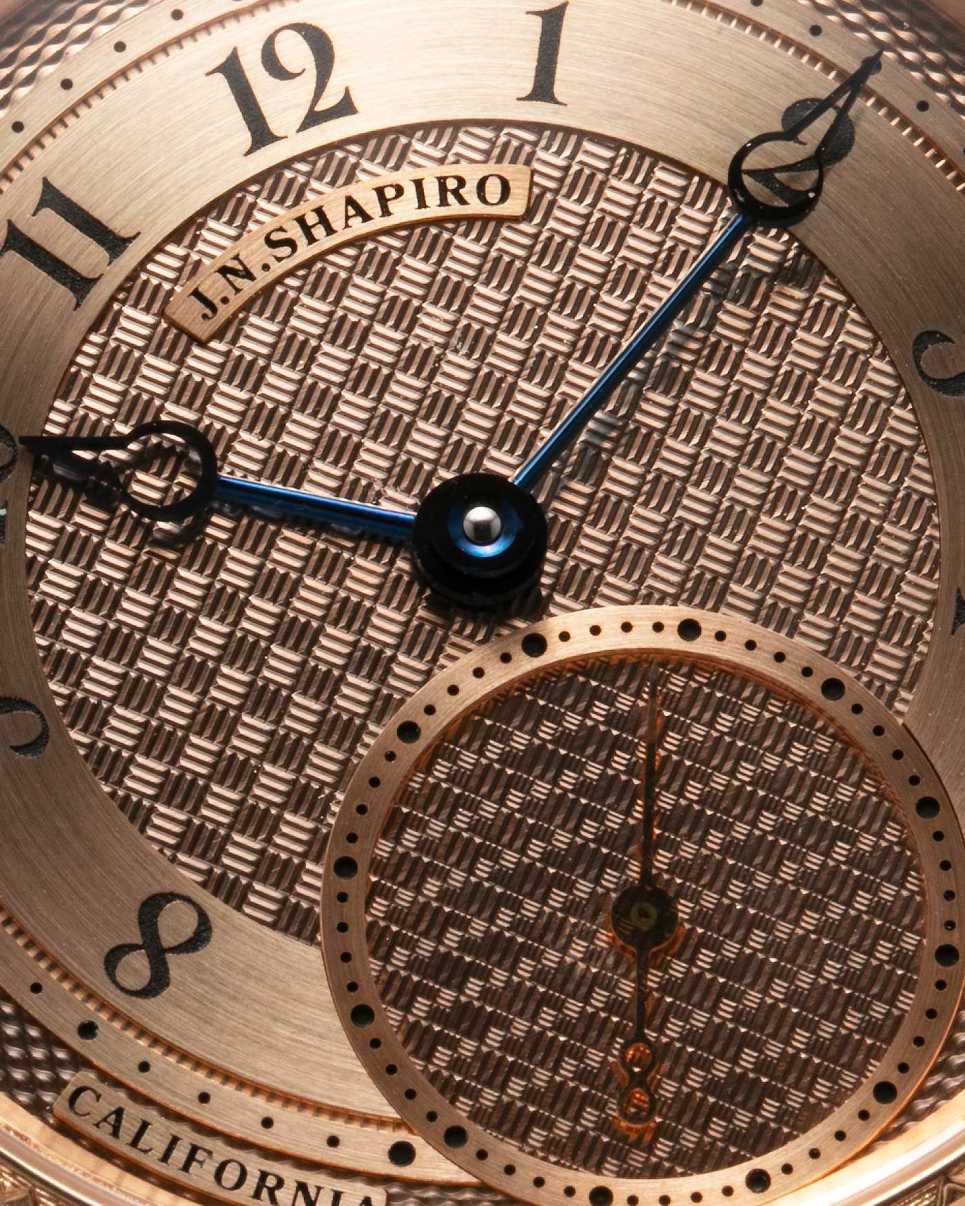 Brand: J.N. Shapiro Year: 2020 Model: Infinity Series (Piece Unique) Material: 18-carat Rose Gold Case, Ruthenium Dial Movement: UWD Cal. 33.1, Manual-Winding Case Diameter: 40mm Lug Width: 22mm Strap: J.N. Shapiro Dark Brown Alligator Strap with Custom Engraved 18-carat Rose Gold Tang Buckle