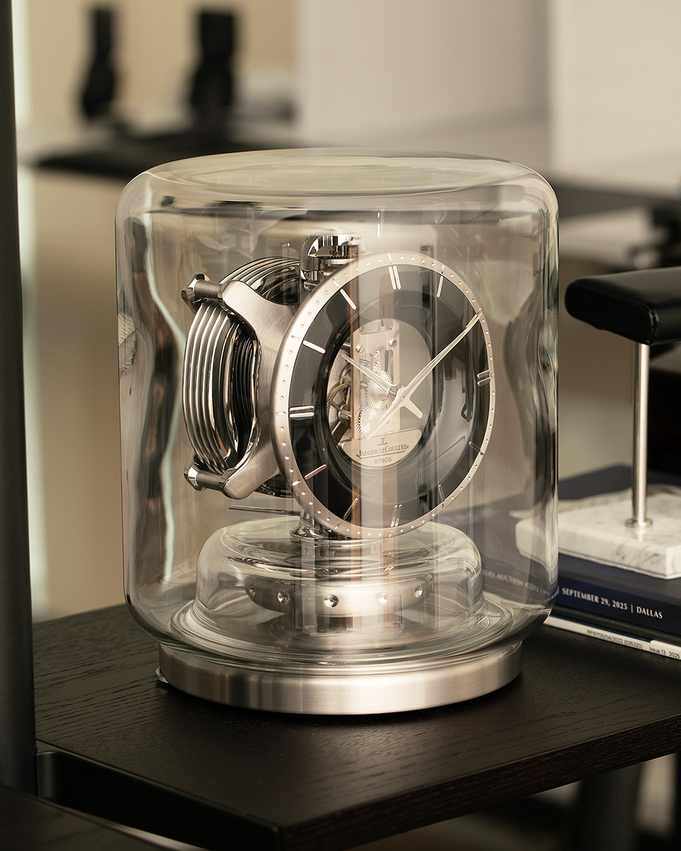 Brand: Jaeger LeCoultre
Year: 2022
Model: Atmos Infinite
Reference Number: Q540531J
Material: Glass Case, Black Lacquer Dial, Stainless Steel Construction
Movement: Jaeger LeCoultre Cal. 570, Perpetual Movement
Dimensions: 215mm (Width) x 253mm (Height)