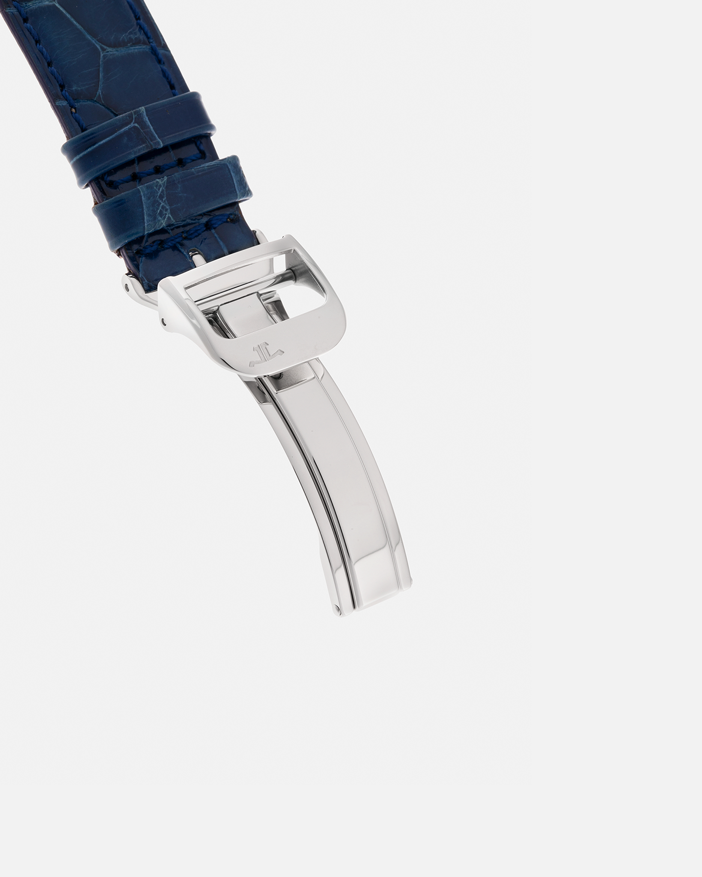 Brand: Jaeger LeCoultre
Year: Late 1990s
Model: Reverso Duoface Japan Edition Blue, Limited Edition of 300 Pieces
Reference Number: 270.8.54
Material: Stainless Steel
Movement: Jaeger LeCoultre Cal. 854, Manual-Wind
Case Dimensions: 42mm (Including Lugs) x 26mm
Lug Width: 19mm
Strap: Jaeger LeCoultre Blue Alligator Leather Strap with Signed Stainless Steel Deployant Clasp