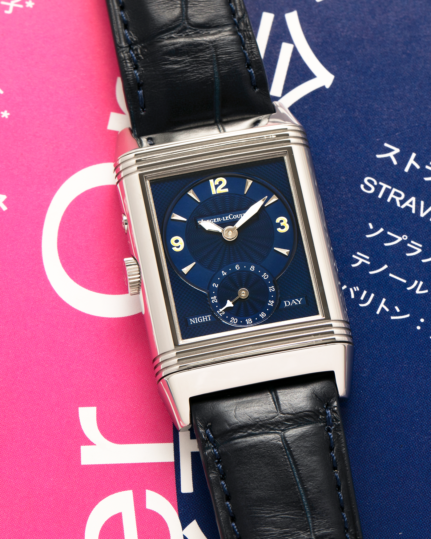 Brand: Jaeger LeCoultre
Year: Late 1990s
Model: Reverso Duoface Japan Edition Blue, Limited Edition of 300 Pieces
Reference Number: 270.8.54
Material: Stainless Steel
Movement: Jaeger LeCoultre Cal. 854, Manual-Wind
Case Dimensions: 42mm (Including Lugs) x 26mm
Lug Width: 19mm
Strap: Jaeger LeCoultre Black Alligator Leather Strap with Signed Stainless Steel Deployant Clasp