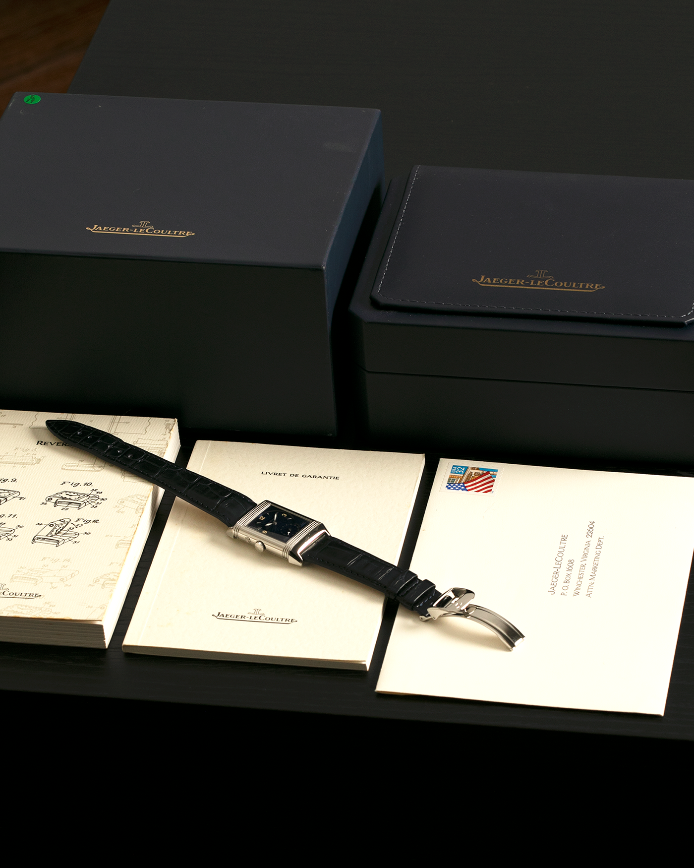 Brand: Jaeger LeCoultre
Year: Late 1990s
Model: Reverso Duoface Japan Edition Blue, Limited Edition of 300 Pieces
Reference Number: 270.8.54
Material: Stainless Steel
Movement: Jaeger LeCoultre Cal. 854, Manual-Wind
Case Dimensions: 42mm (Including Lugs) x 26mm
Lug Width: 19mm
Strap: Jaeger LeCoultre Black Alligator Leather Strap with Signed Stainless Steel Deployant Clasp