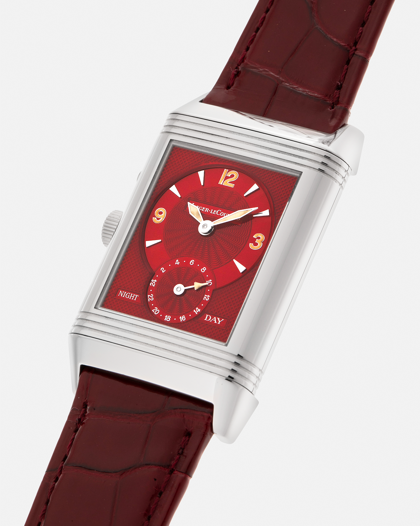Brand: Jaeger LeCoultre
Year: Late 1990s
Model: Reverso Duoface Japan Edition Red, Limited Edition of 300 Pieces
Reference Number: 270.8.54
Material: Stainless Steel
Movement: Jaeger LeCoultre Cal. 854, Manual-Wind
Case Dimensions: 42mm (Including Lugs) x 26mm
Lug Width: 19mm
Strap: Jaeger LeCoultre Burgundy Red Alligator Leather Strap with Signed Stainless Steel Deployant Clasp