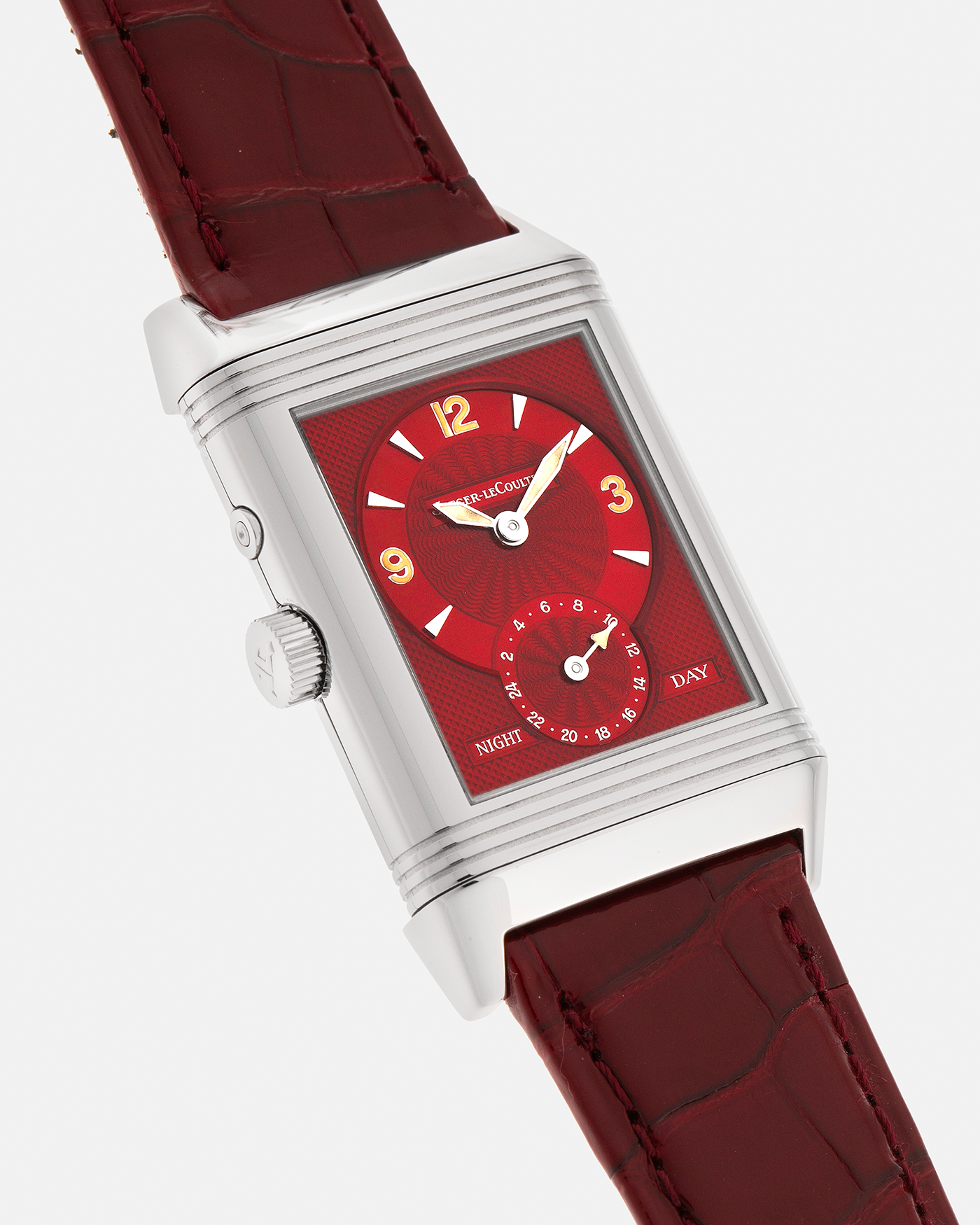 Brand: Jaeger LeCoultre
Year: Late 1990s
Model: Reverso Duoface Japan Edition Red, Limited Edition of 300 Pieces
Reference Number: 270.8.54
Material: Stainless Steel
Movement: Jaeger LeCoultre Cal. 854, Manual-Wind
Case Dimensions: 42mm (Including Lugs) x 26mm
Lug Width: 19mm
Strap: Jaeger LeCoultre Burgundy Red Alligator Leather Strap with Signed Stainless Steel Deployant Clasp