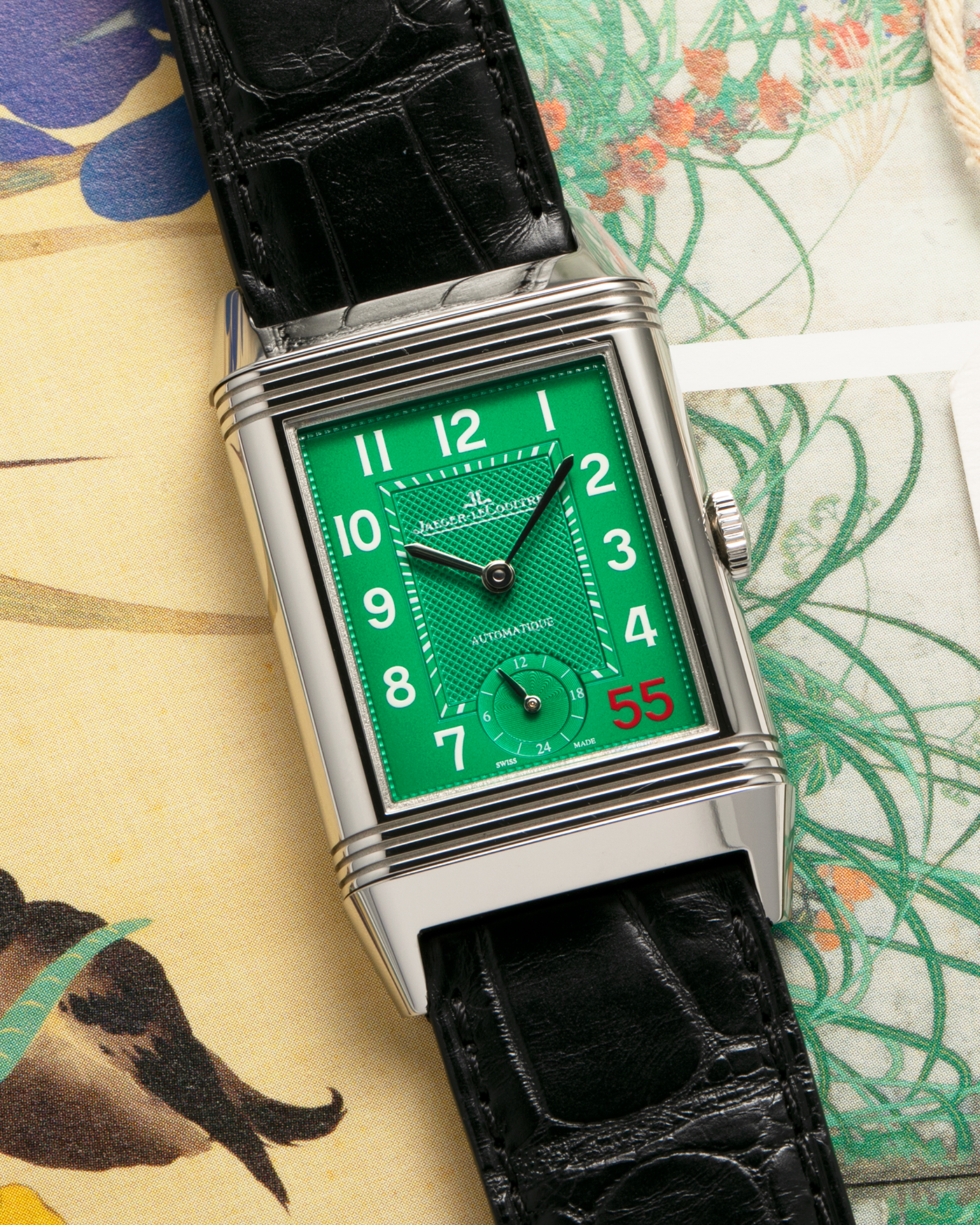 Brand: Jaeger LeCoultre
Year: 2016
Model: Grande Reverso 976 ‘55th Anniversary of Kuwait’, Limited Edition of 55 Pieces
Reference: 278.8.56
Material: Stainless Steel
Movement: Jaeger LeCoultre Cal. 967B, Self-Winding
Case Dimensions: 46mm (Including Lugs) x 27mm x 9mm
Lug Width: 20mm
Straps: Jaeger LeCoultre Black Alligator Leather Strap with Signed Stainless Steel Deployant Buckle, with extra Jaeger LeCoultre Black Alligator Leather Strap