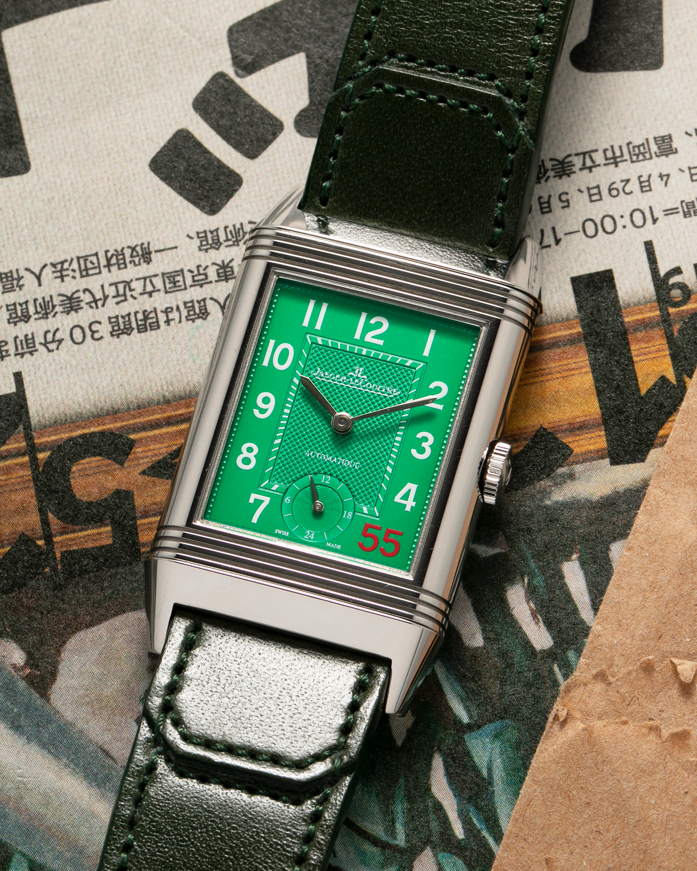 Brand: Jaeger LeCoultre
Year: 2020
Model: Grande Reverso 976 ‘55th Anniversary of Kuwait’, Limited Edition of 55 Pieces
Reference: 278.8.56
Material: Stainless Steel
Movement: Jaeger LeCoultre Cal. 967B, Self-Winding
Case Dimensions: 46mm (Including Lugs) x 27mm x 9mm
Lug Width: 20mm
Strap: Jaeger LeCoultre Casa Fagliano Olive Green Leather Strap with Signed Stainless Steel Deployant Clasp