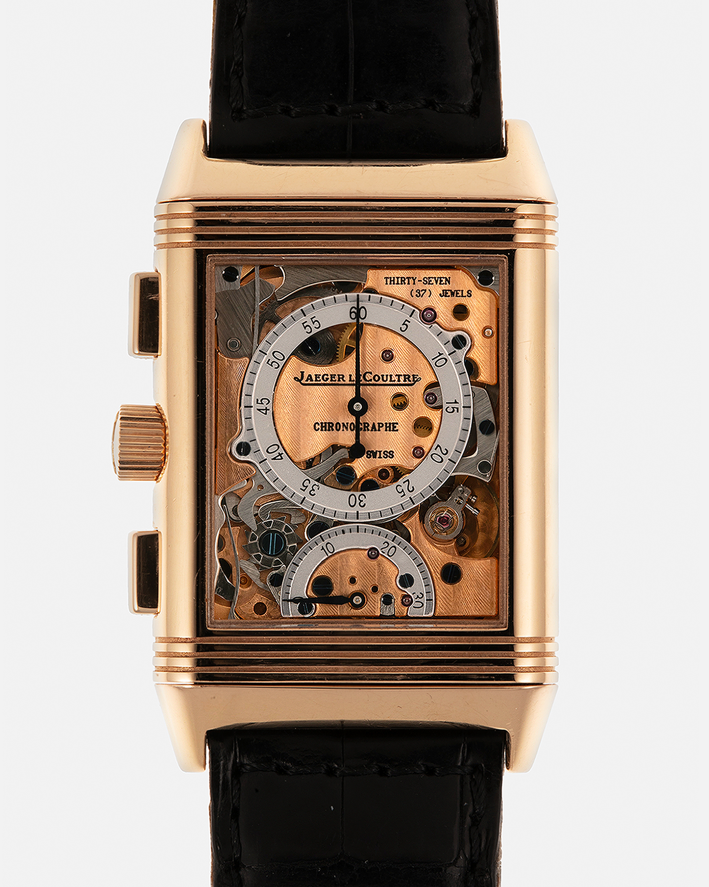 Brand: Jaeger LeCoultre
Year: 1996
Model: Reverso Chronograph Retrograde, Limited to 500 pieces
Reference: 270.2.69
Material: 18-carat Rose Gold
Movement: Jaeger LeCoultre Cal. 829, Manual-Wind
Case Dimensions: 42mm (Including Lugs) x 26mm x 9.5mm
Lug Width: 19mm
Strap: Jaeger-LeCoultre Black Alligator Leather Strap with Signed 18-carat Rose Gold Deployant Clasp