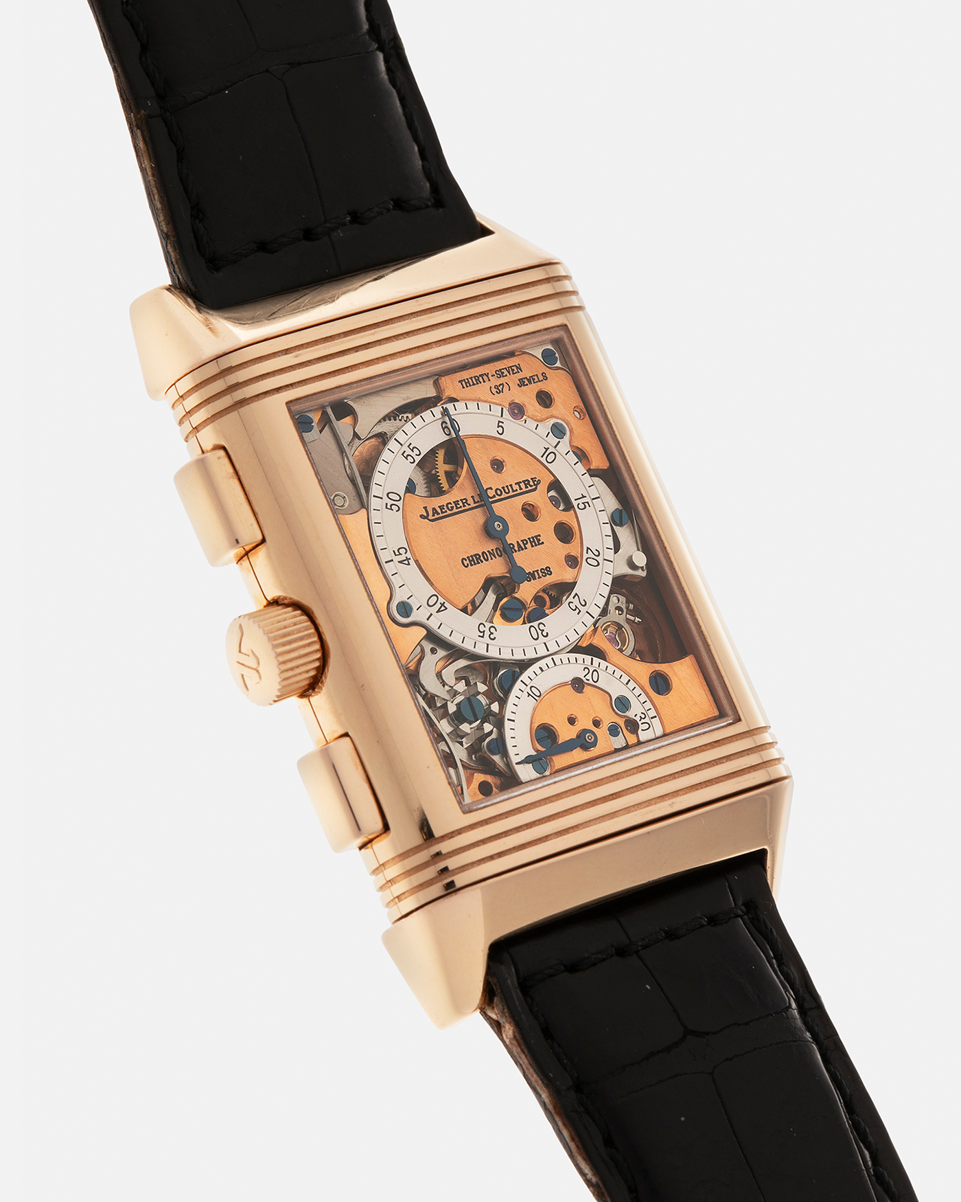 Brand: Jaeger LeCoultre
Year: 1996
Model: Reverso Chronograph Retrograde, Limited to 500 pieces
Reference: 270.2.69
Material: 18-carat Rose Gold
Movement: Jaeger LeCoultre Cal. 829, Manual-Wind
Case Dimensions: 42mm (Including Lugs) x 26mm x 9.5mm
Lug Width: 19mm
Strap: Jaeger-LeCoultre Black Alligator Leather Strap with Signed 18-carat Rose Gold Deployant Clasp